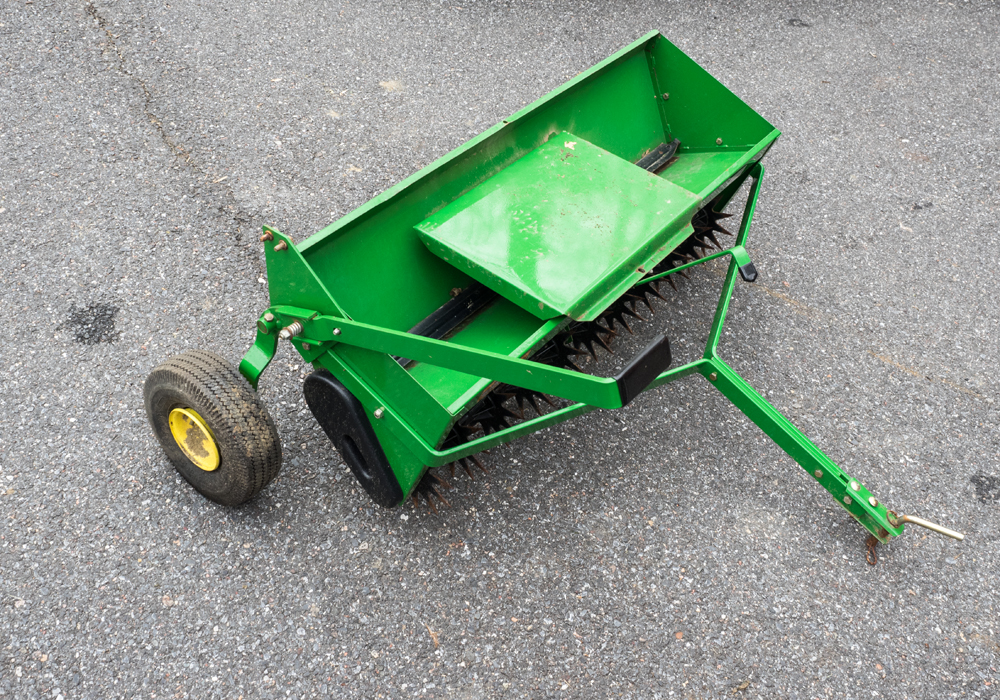 John Deere x320 Tractor with Attachments