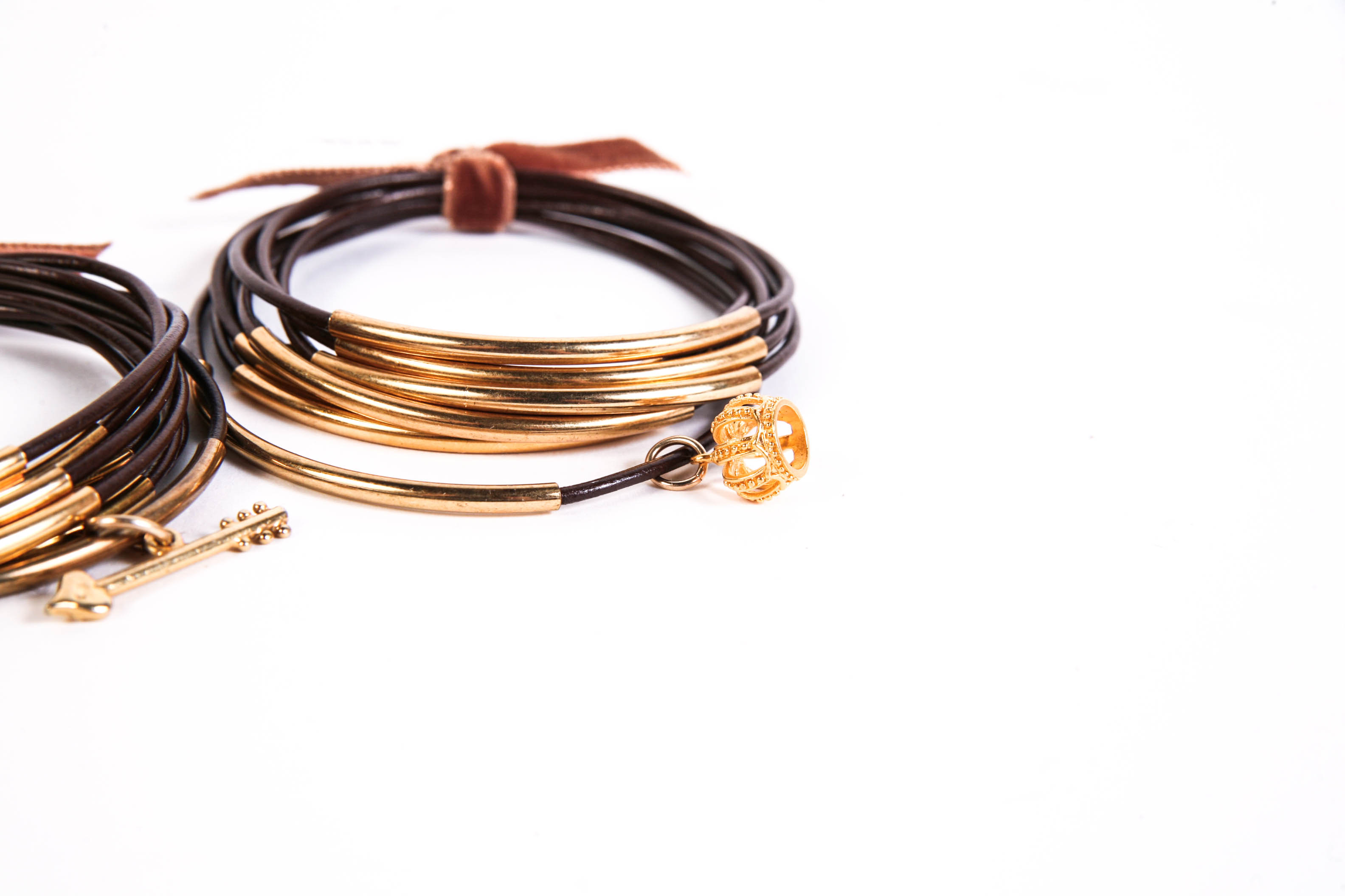 Grouping of Three Sets of Brown Leather Bracelets