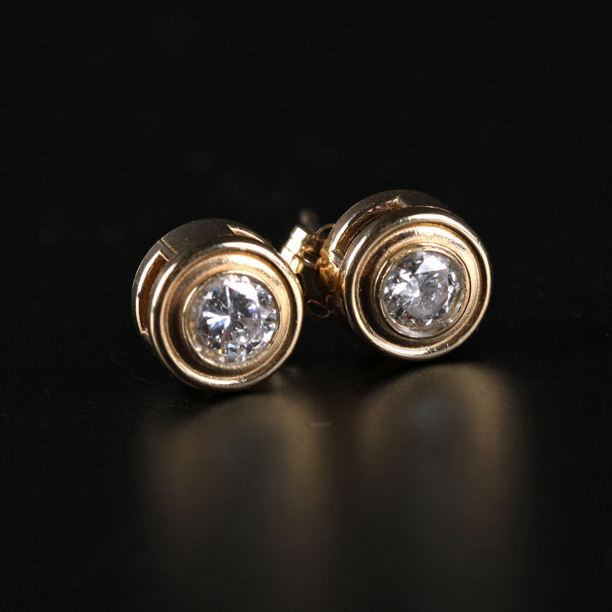 Pair of Round Cut Diamond Earrings in 14K Gold Setting