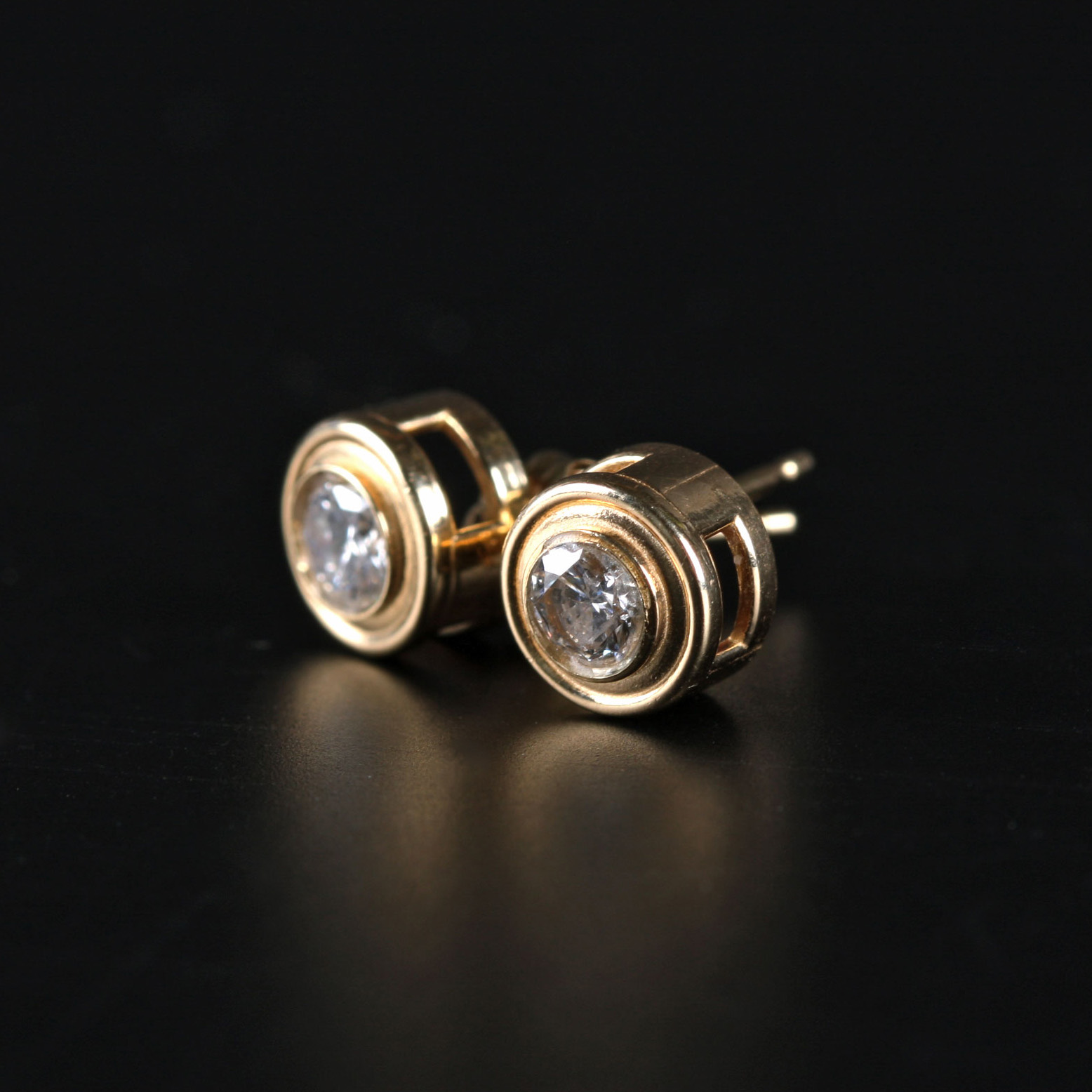 Pair of Round Cut Diamond Earrings in 14K Gold Setting