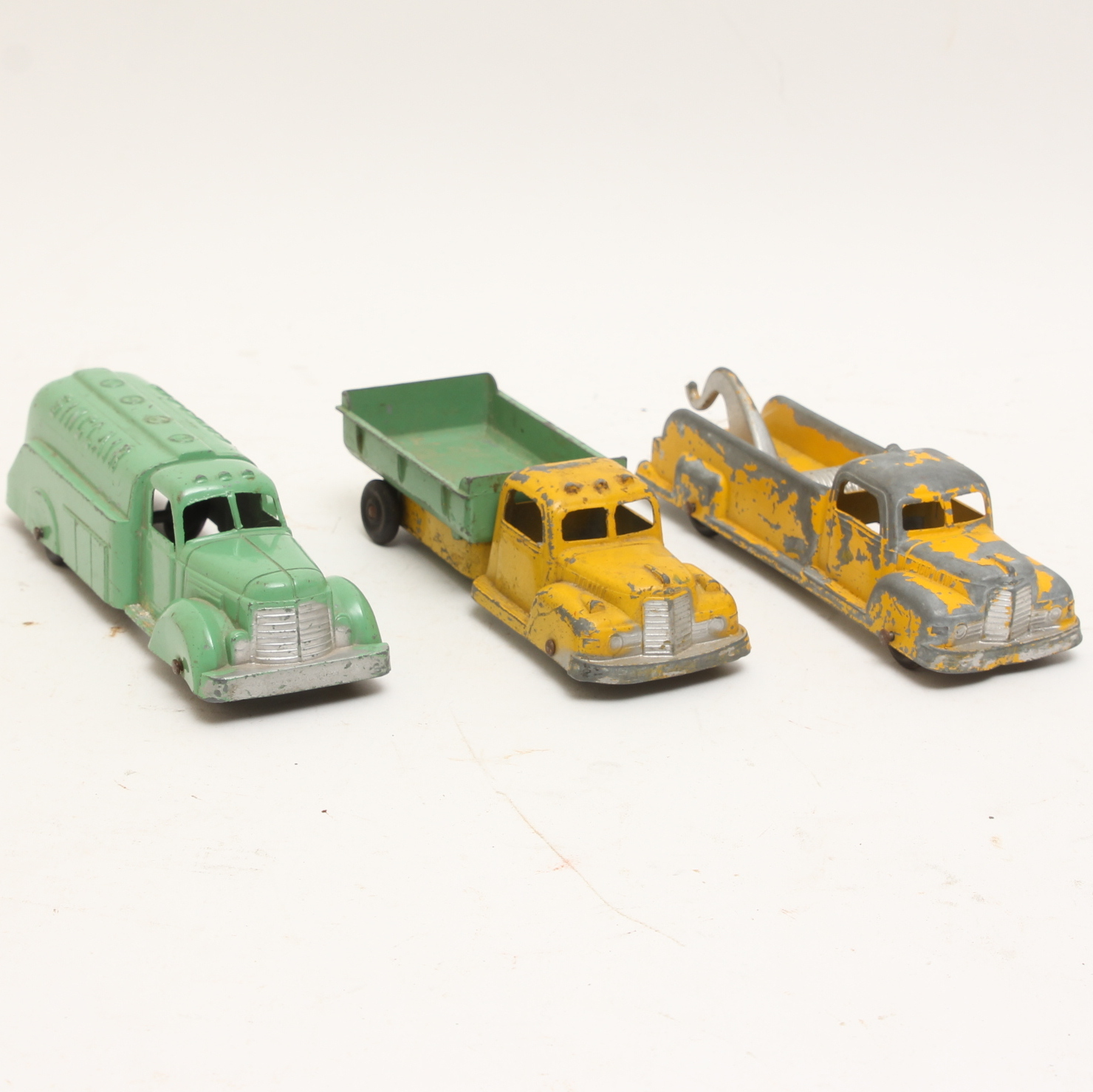 Vintage Tootsie Toy Trucks Including Sinclair Tanker