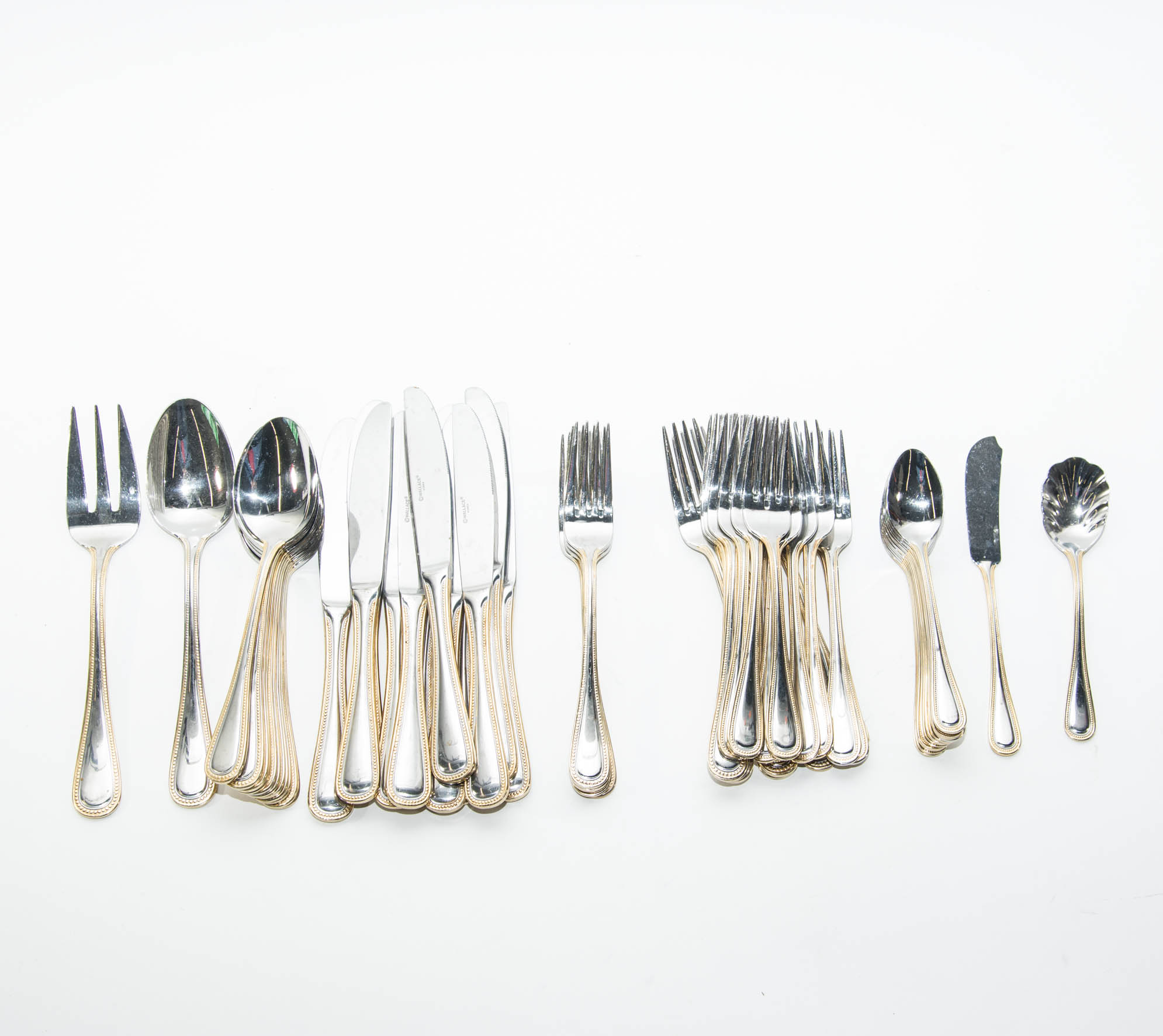 Wallace Stainless Steel and Gold 64 piece Flatware Service for 12 in the Gold Royal Bead Pattern