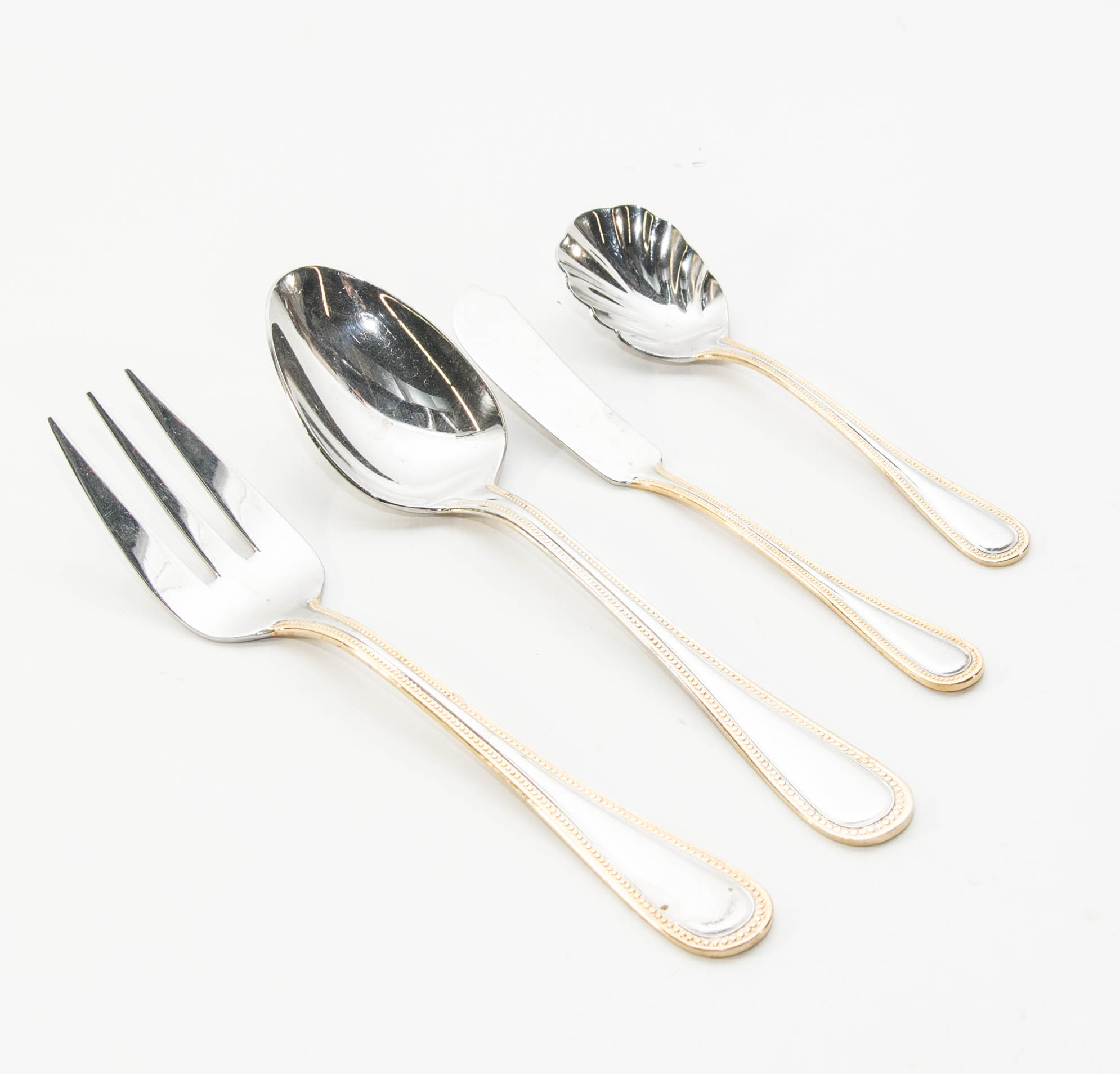Wallace Stainless Steel and Gold 64 piece Flatware Service for 12 in the Gold Royal Bead Pattern