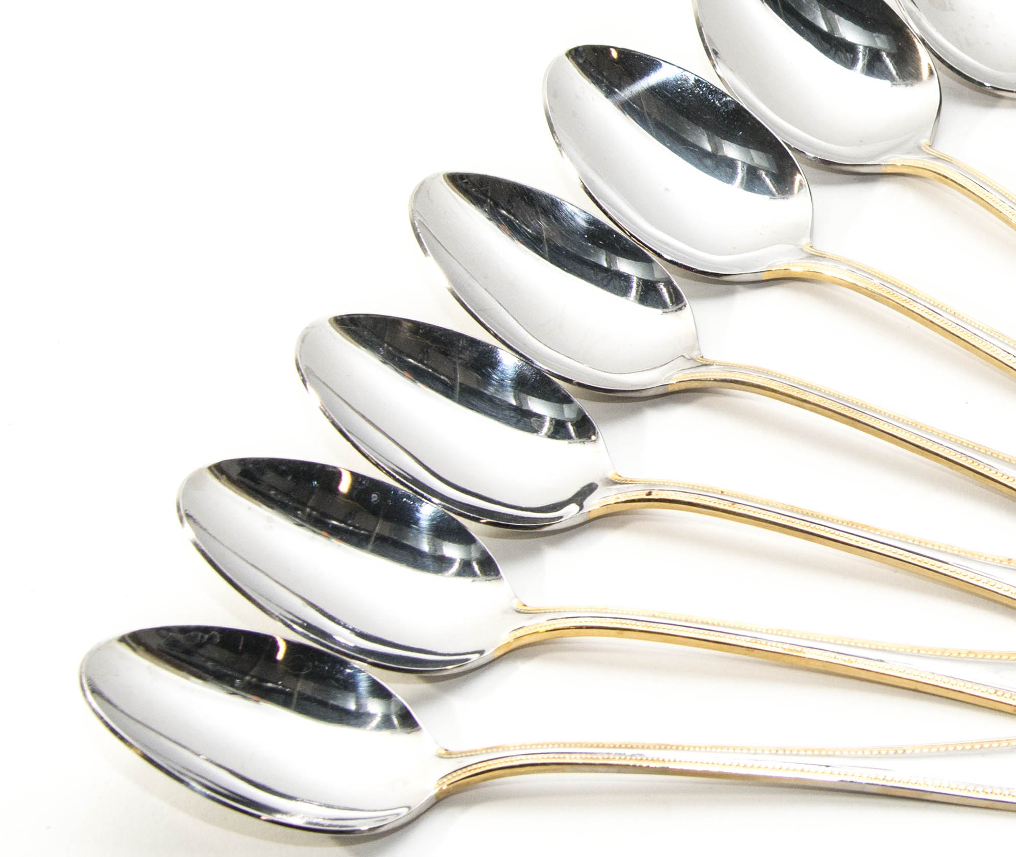 Wallace Stainless Steel and Gold 64 piece Flatware Service for 12 in the Gold Royal Bead Pattern