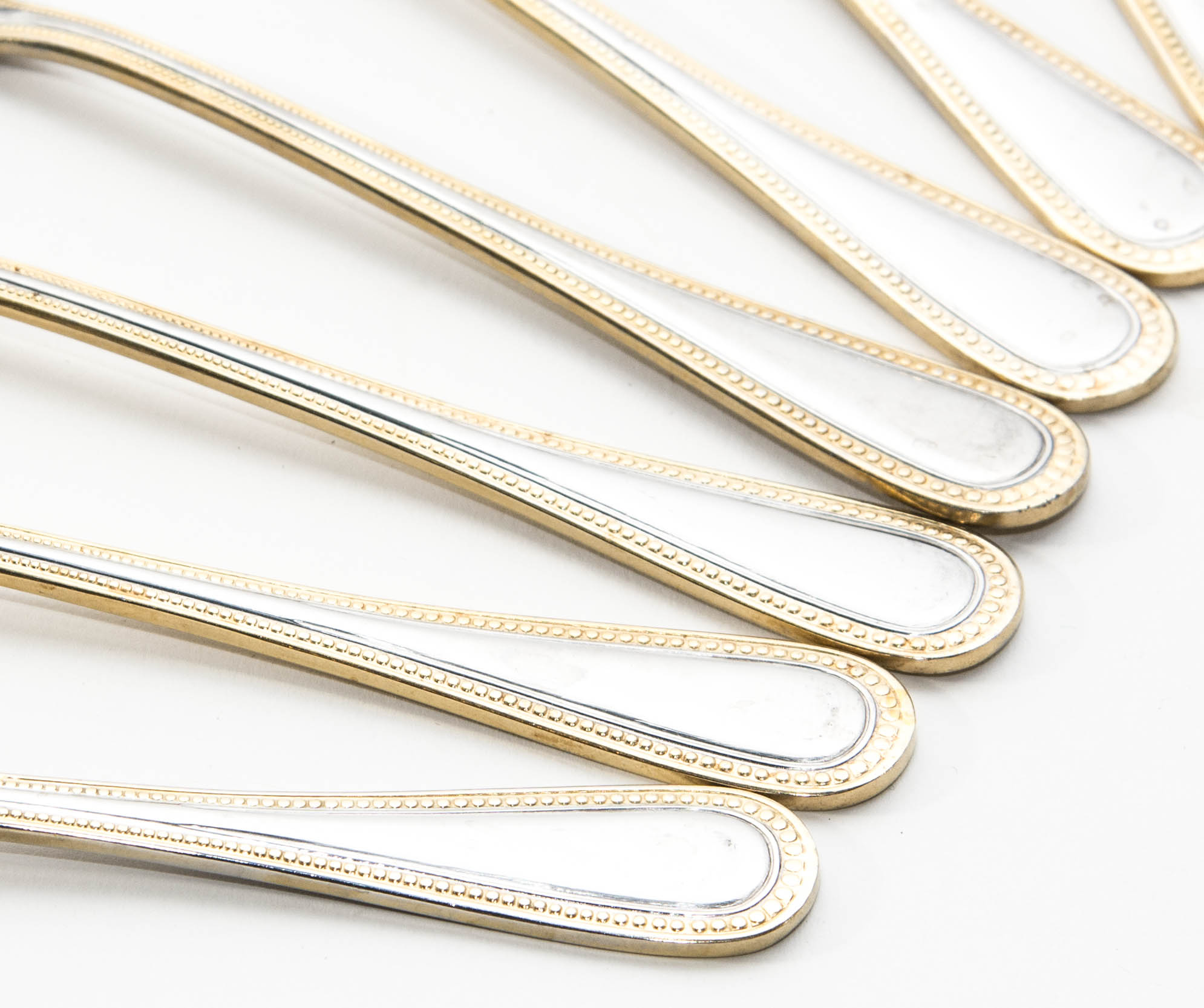 Wallace Stainless Steel and Gold 64 piece Flatware Service for 12 in the Gold Royal Bead Pattern