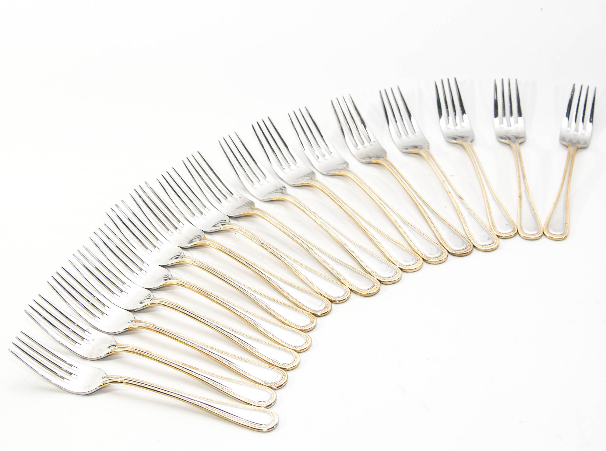 Wallace Stainless Steel and Gold 64 piece Flatware Service for 12 in the Gold Royal Bead Pattern