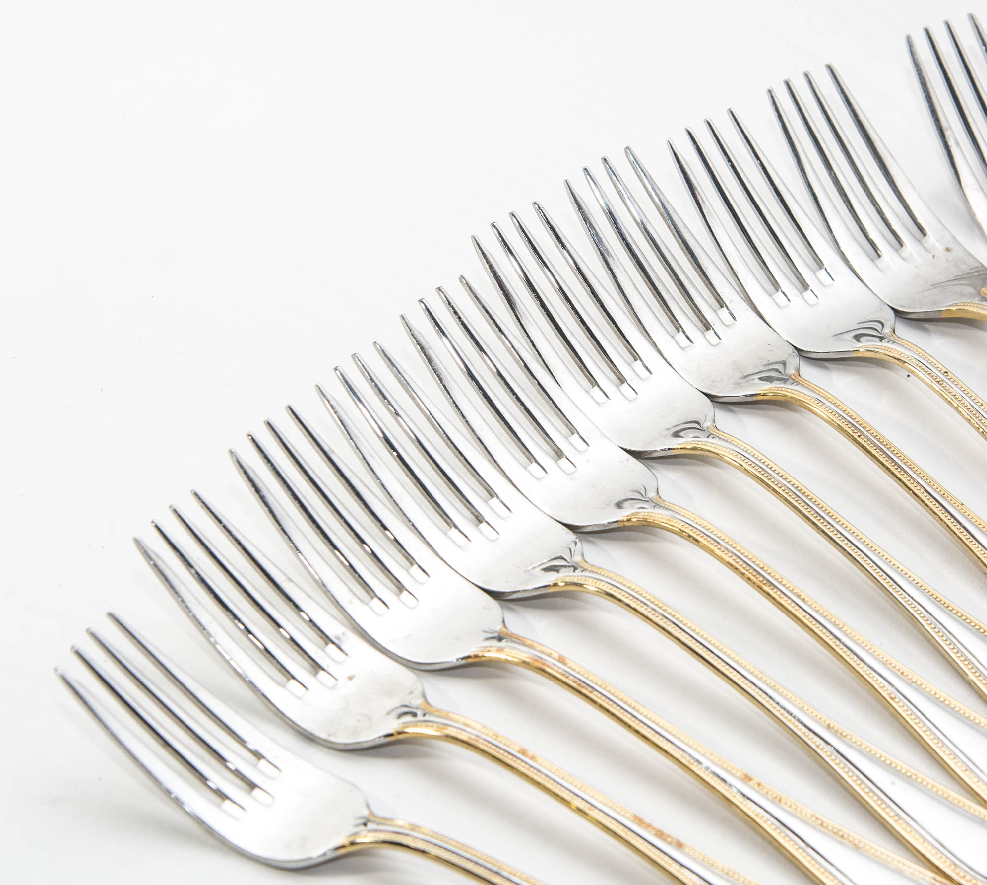 Wallace Stainless Steel and Gold 64 piece Flatware Service for 12 in the Gold Royal Bead Pattern