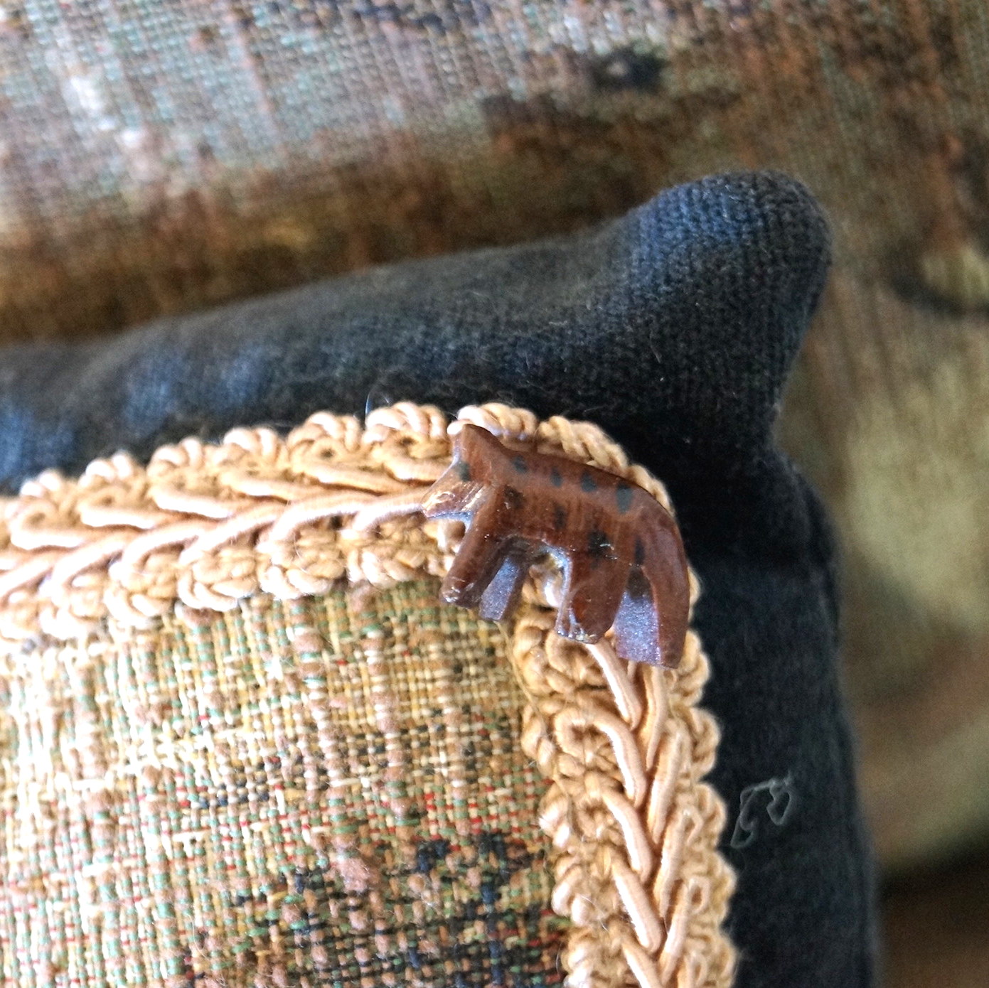 Wood Chair with Safari Themed Upholstery and Pillows