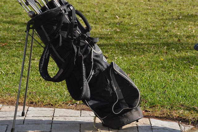 Ogio "Vaporlite" Golf Bag Stand with Assorted Vintage and Modern Clubs