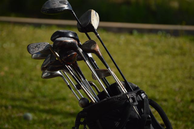 Ogio "Vaporlite" Golf Bag Stand with Assorted Vintage and Modern Clubs