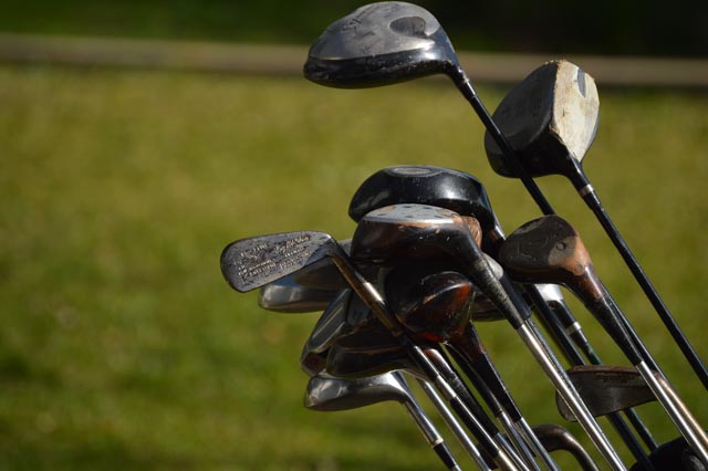 Ogio "Vaporlite" Golf Bag Stand with Assorted Vintage and Modern Clubs