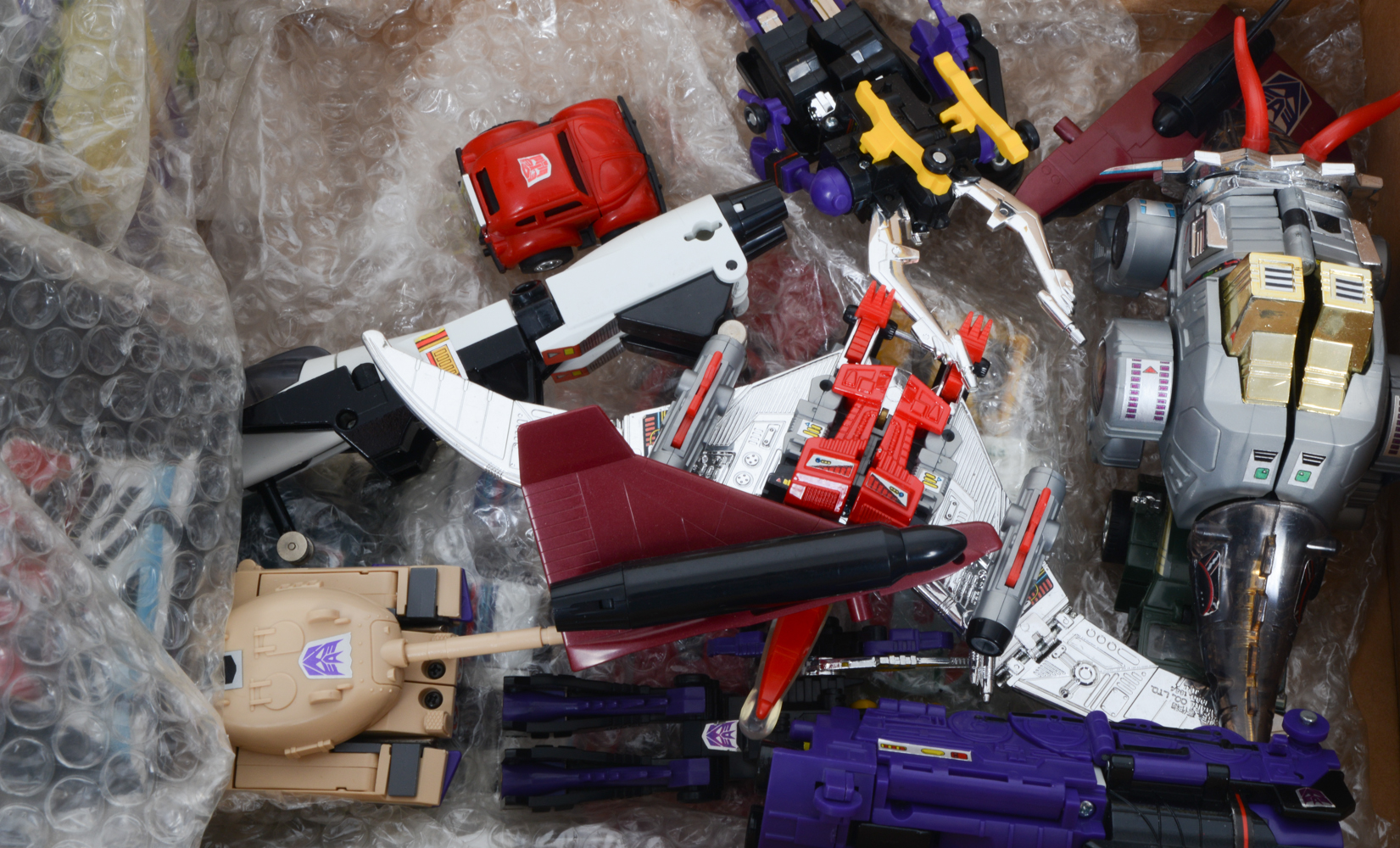 Collection of Vintage Takara Transformer Action Figures
