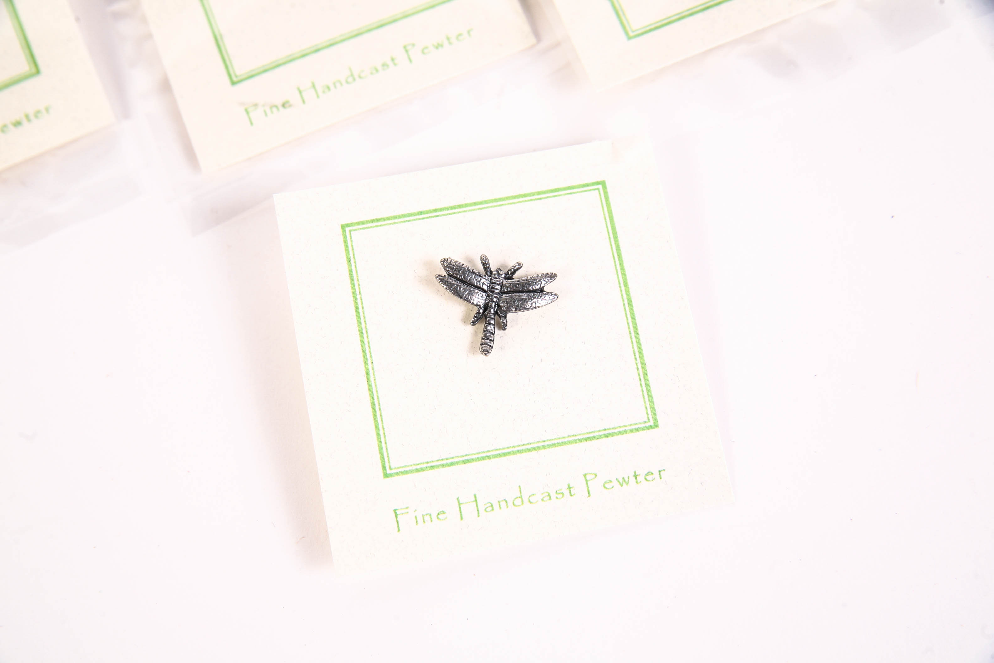 Collection of Jim Clift Bronze Bee Lapel Pins