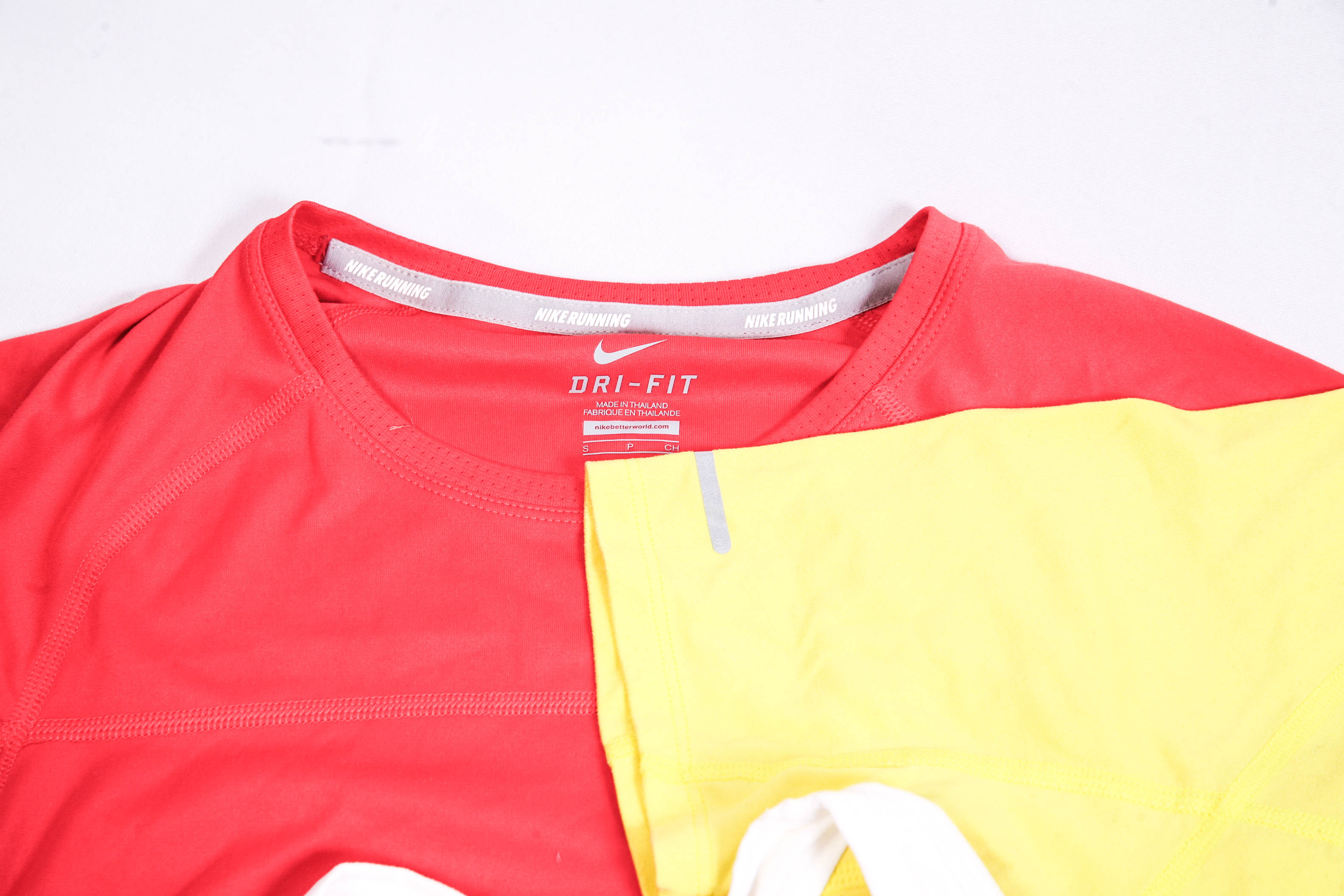 Grouping of Six Nike Women's Apparel Pieces