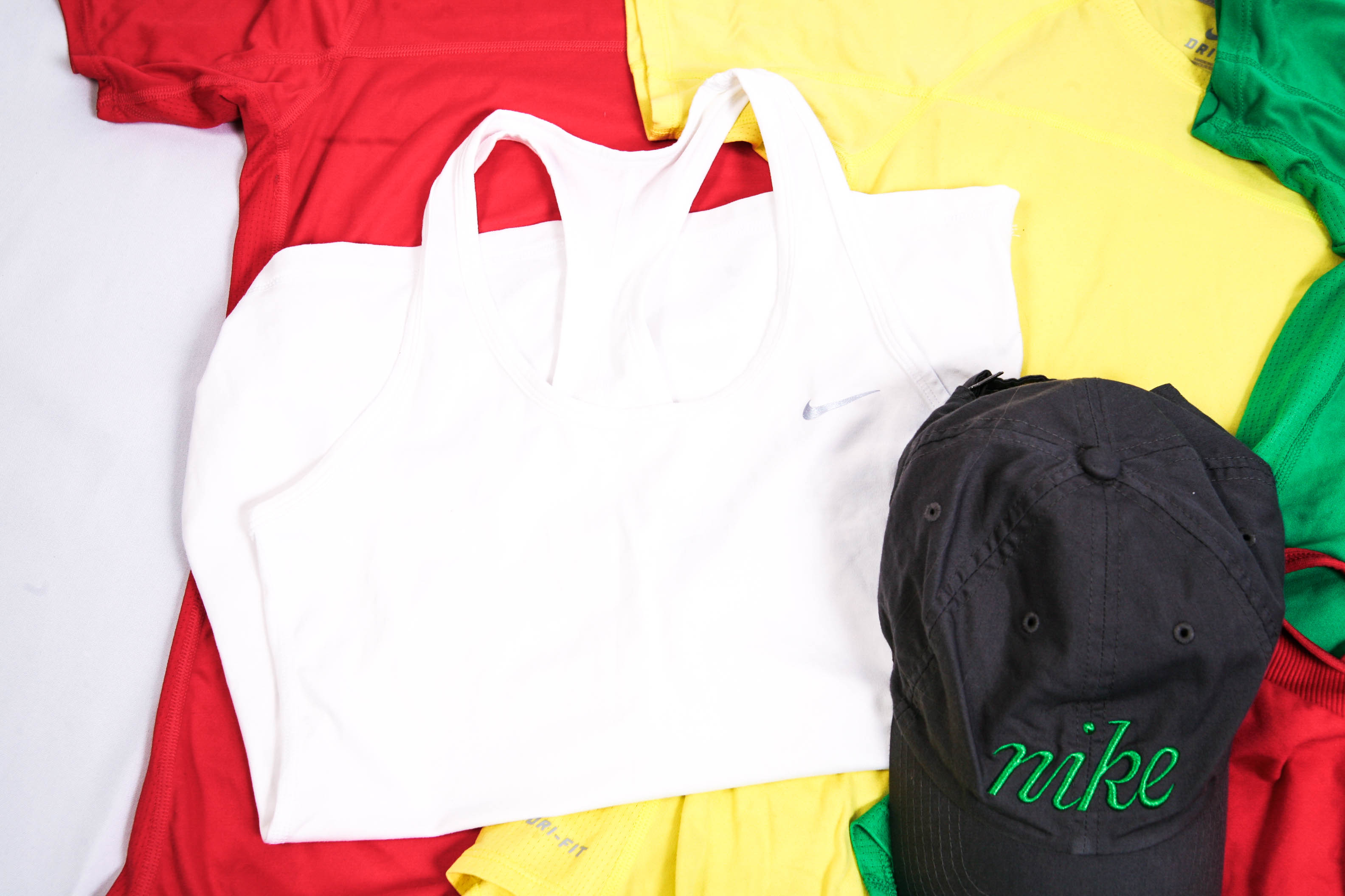 Grouping of Six Nike Women's Apparel Pieces