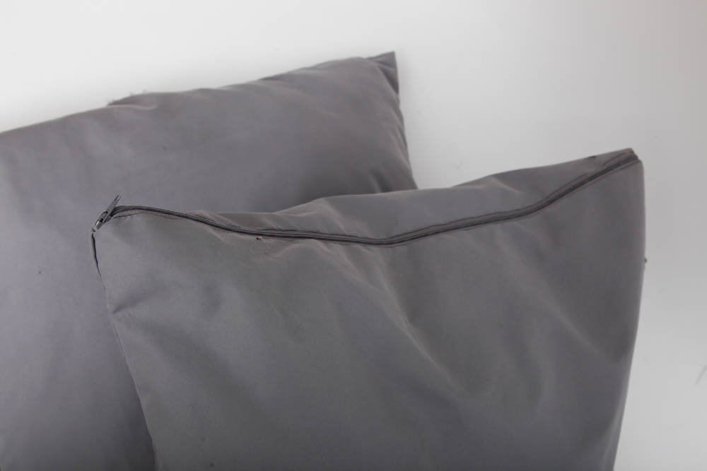 Grouping of Decorative Pillows and Throw