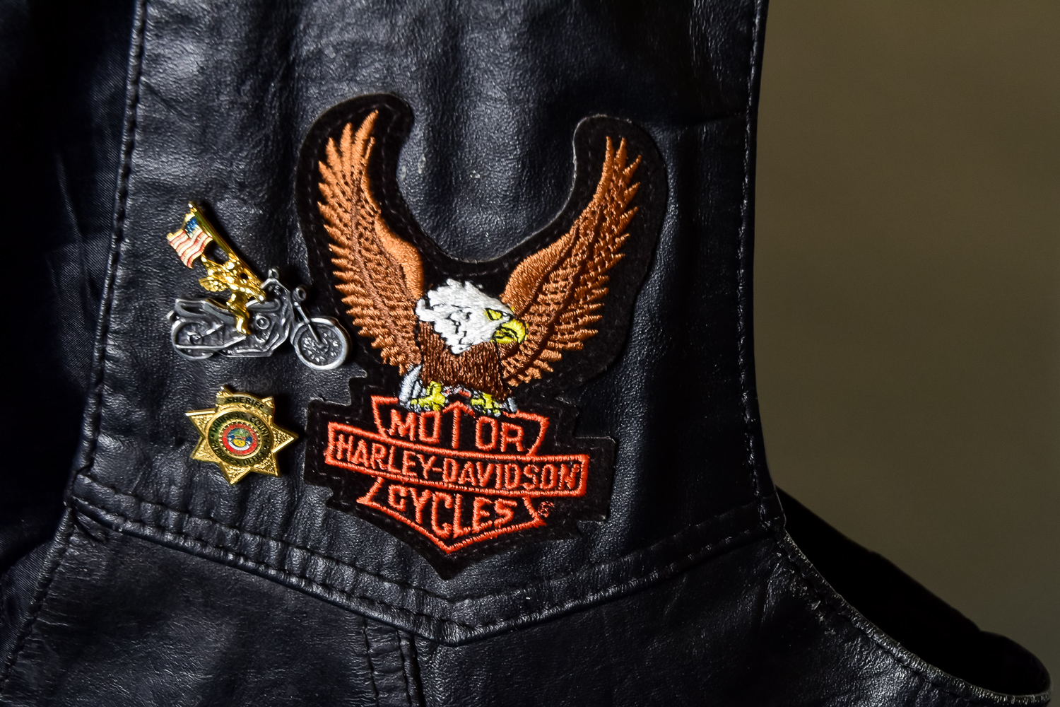 Leather Jacket and Vest with Harley Davidson Patches