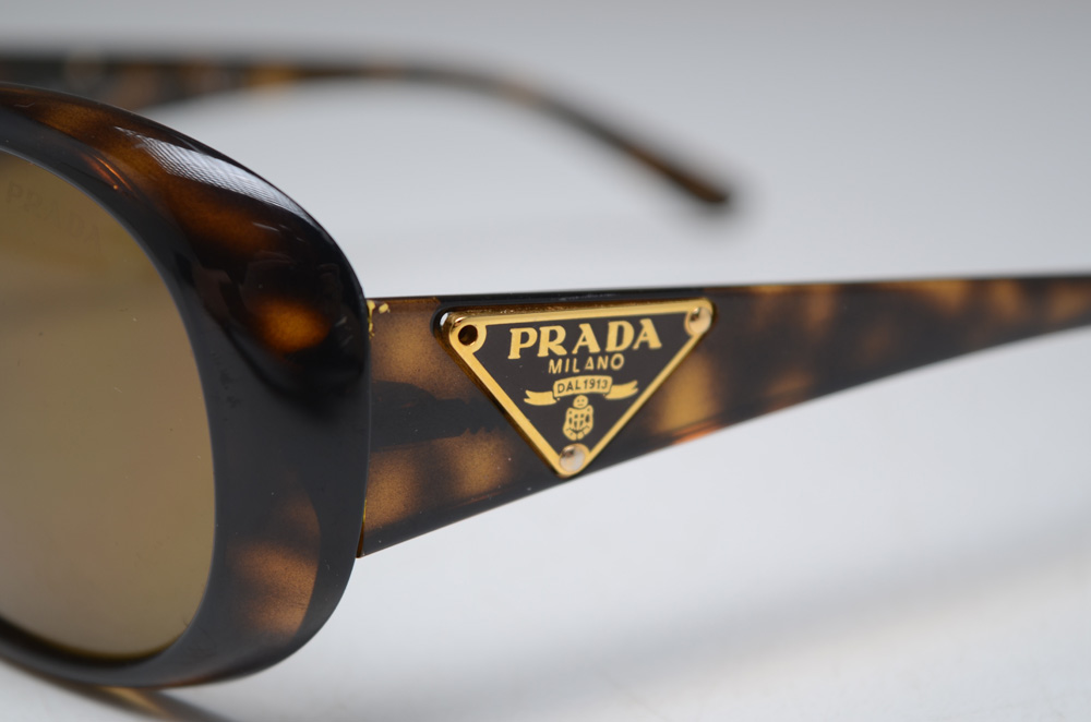 Pair of Prada Designer Polarized Sunglasses