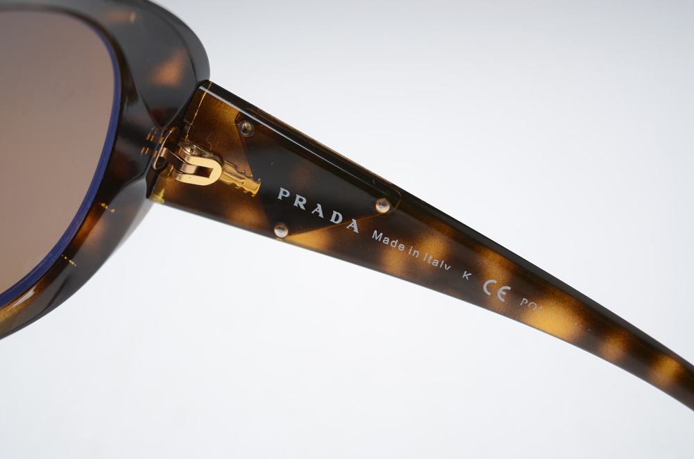 Pair of Prada Designer Polarized Sunglasses