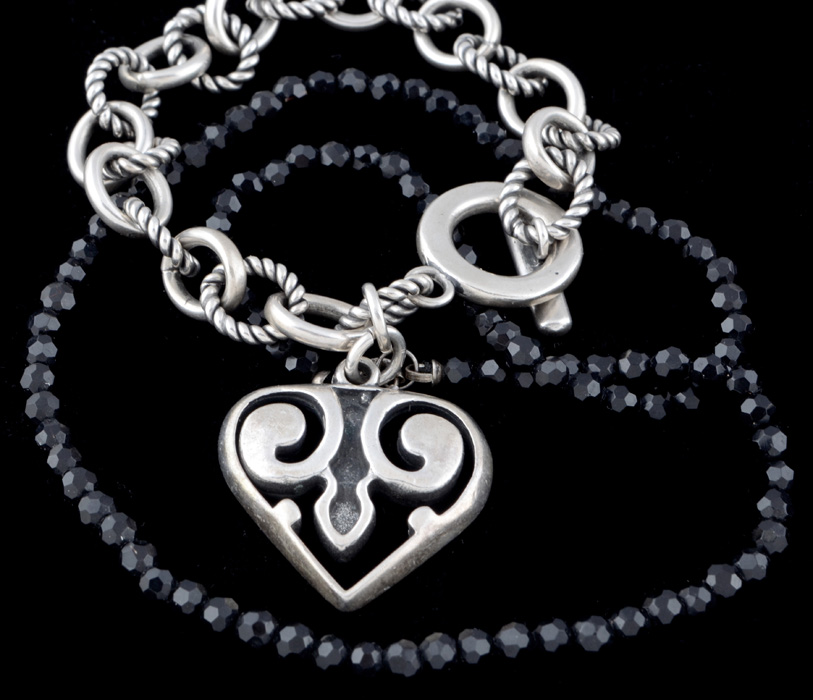 Group of Sterling Silver Jewelry Including an Exix Link Bracelet