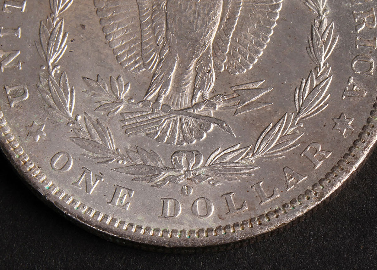 Four 1883-O Morgan Silver Dollars