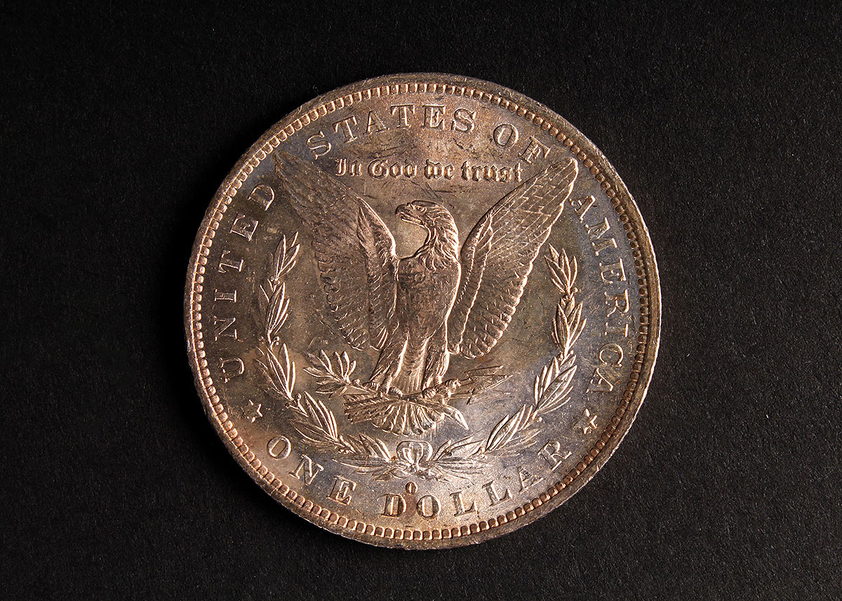 Four 1883-O Morgan Silver Dollars