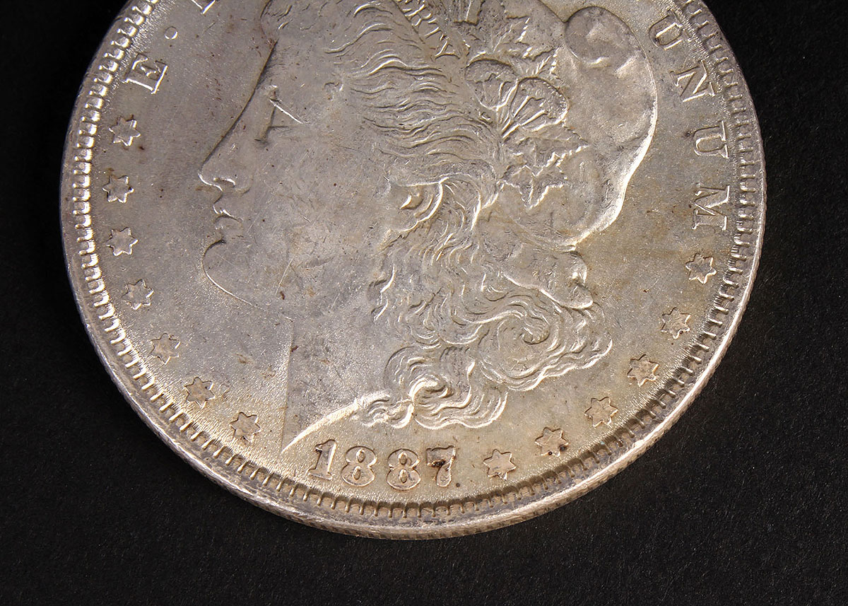 Three Morgan Silver Dollars