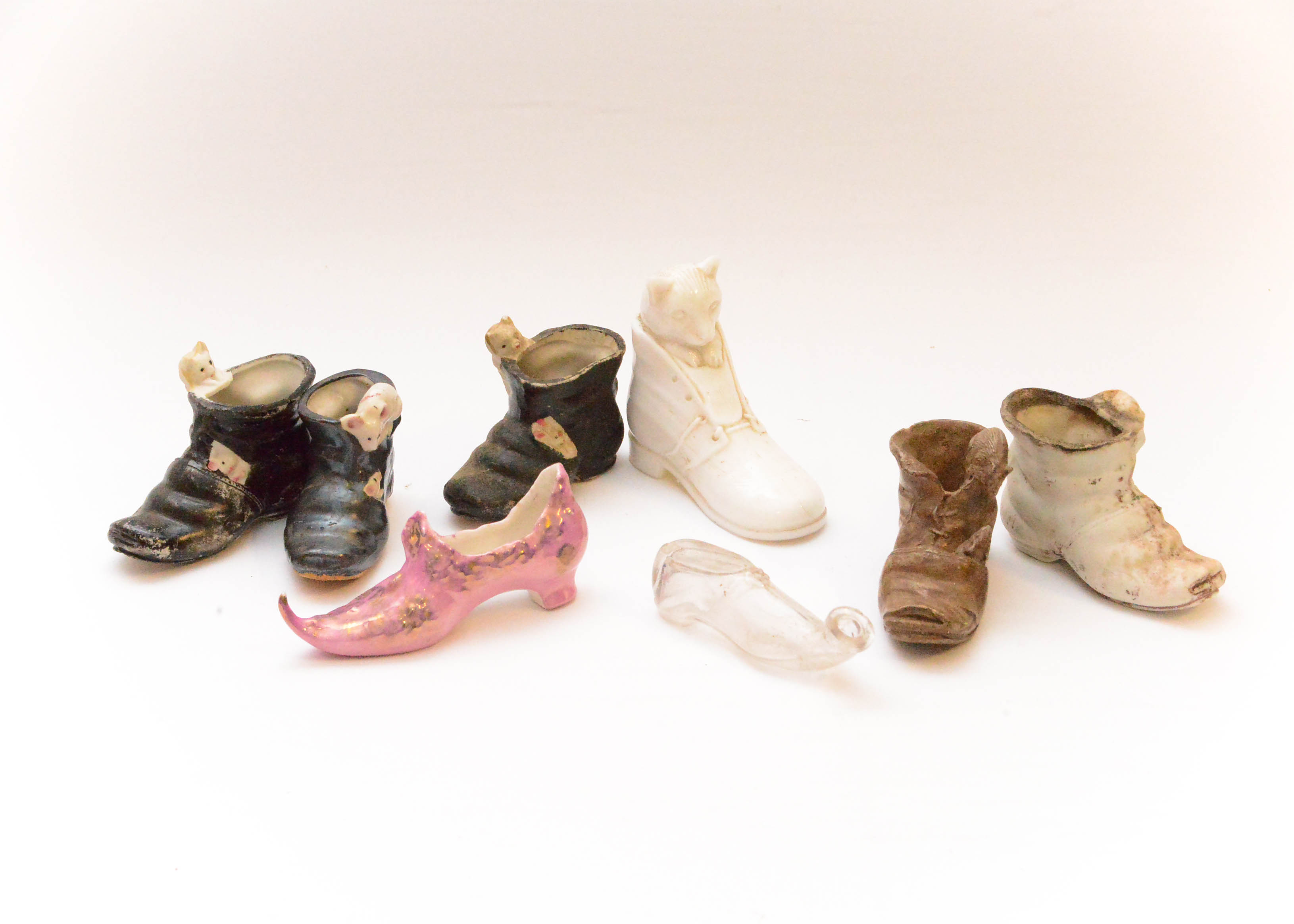Grouping of Small Shoe Figurines