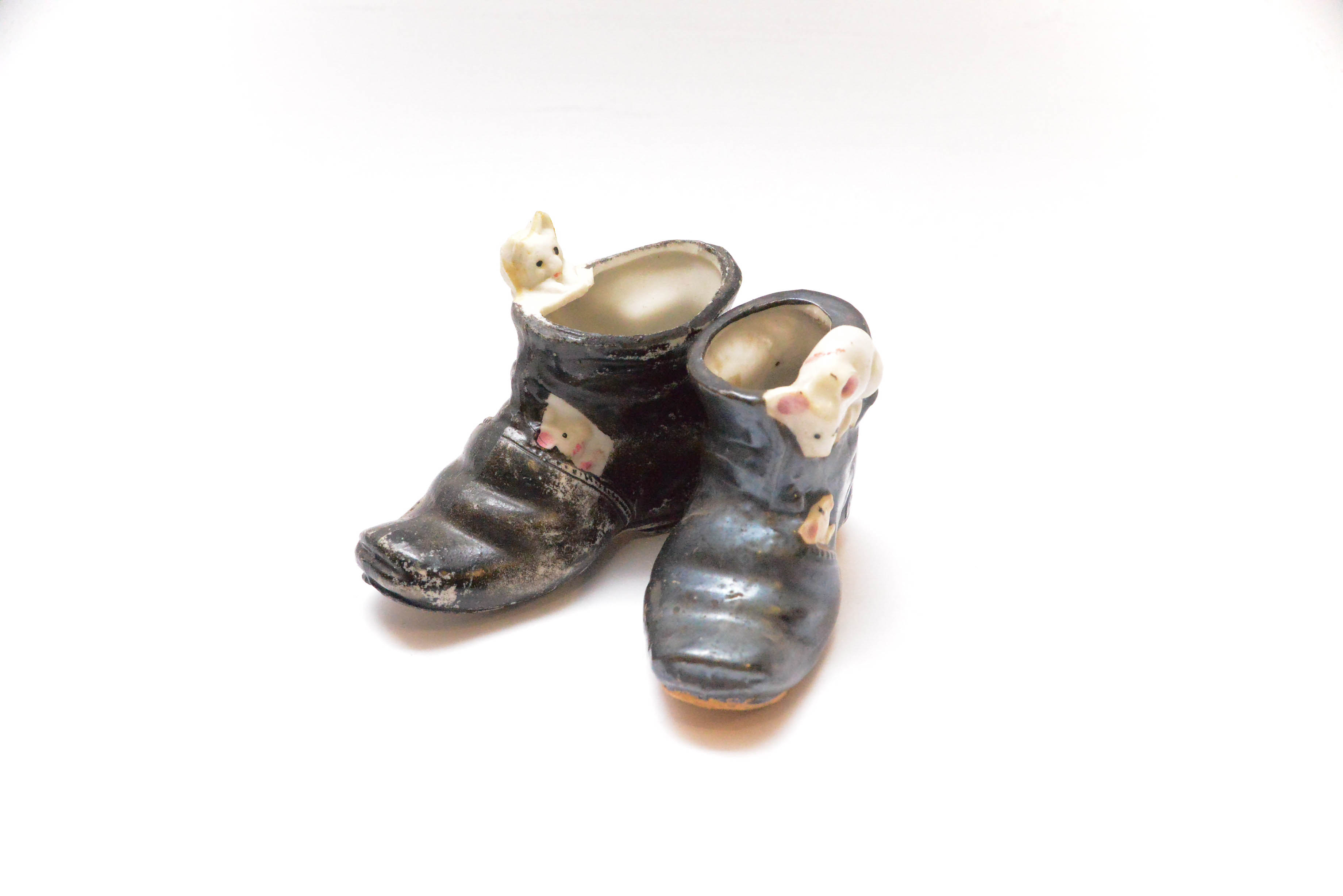 Grouping of Small Shoe Figurines