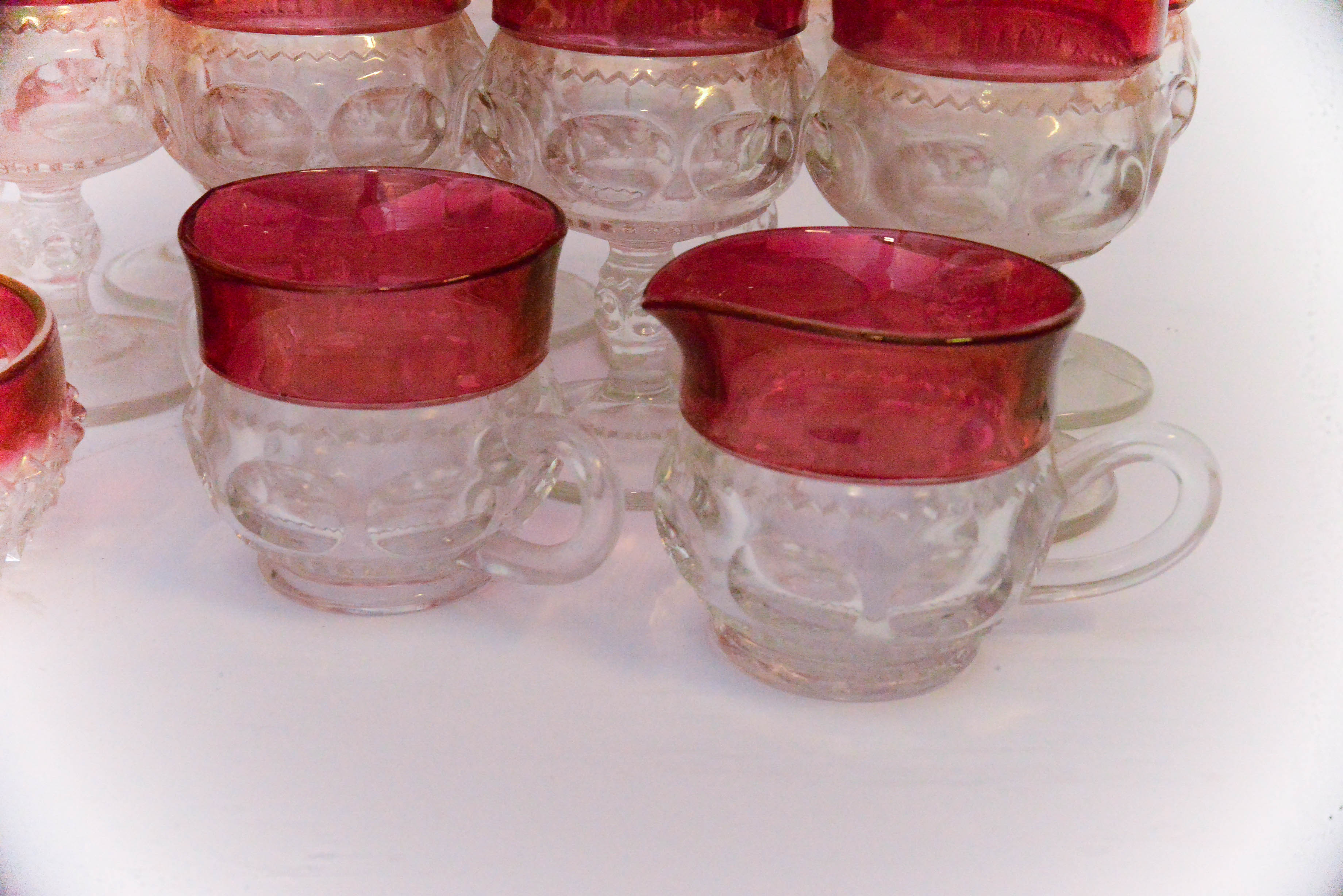 Depression Glassware in Thumbprint Pattern with Red Borders