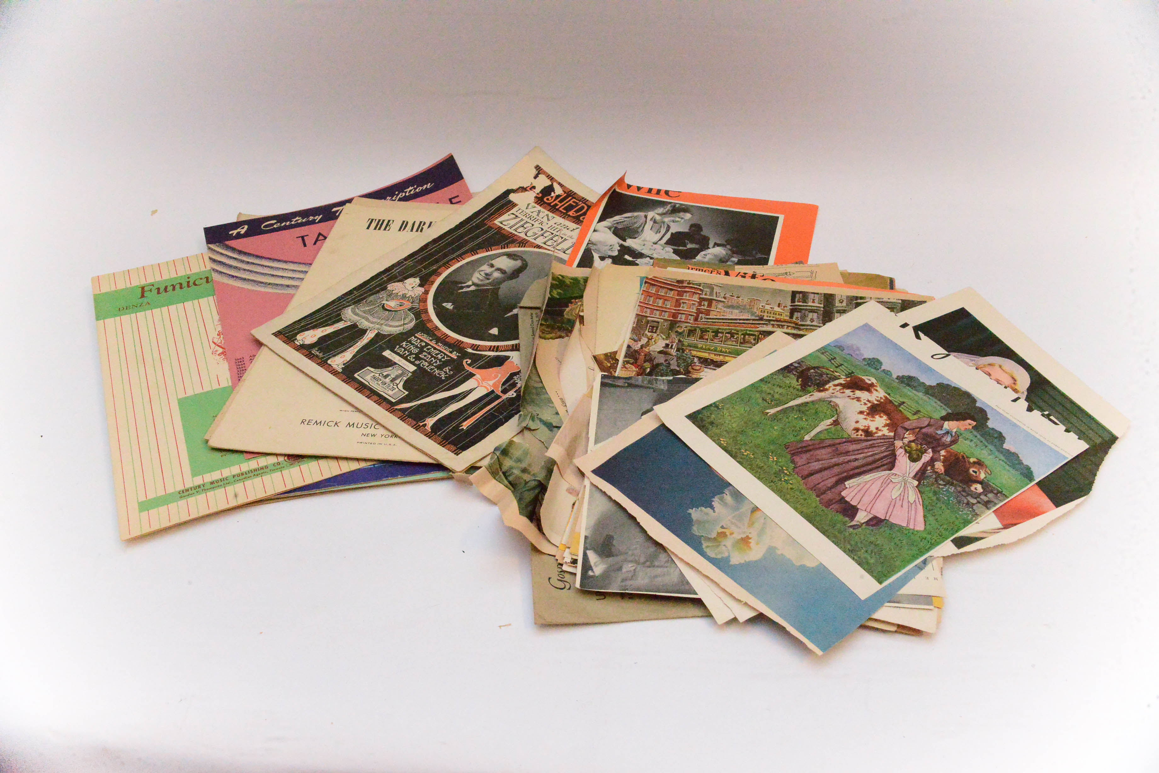 Collection of Vintage Magazine Clippings and Sheet Music
