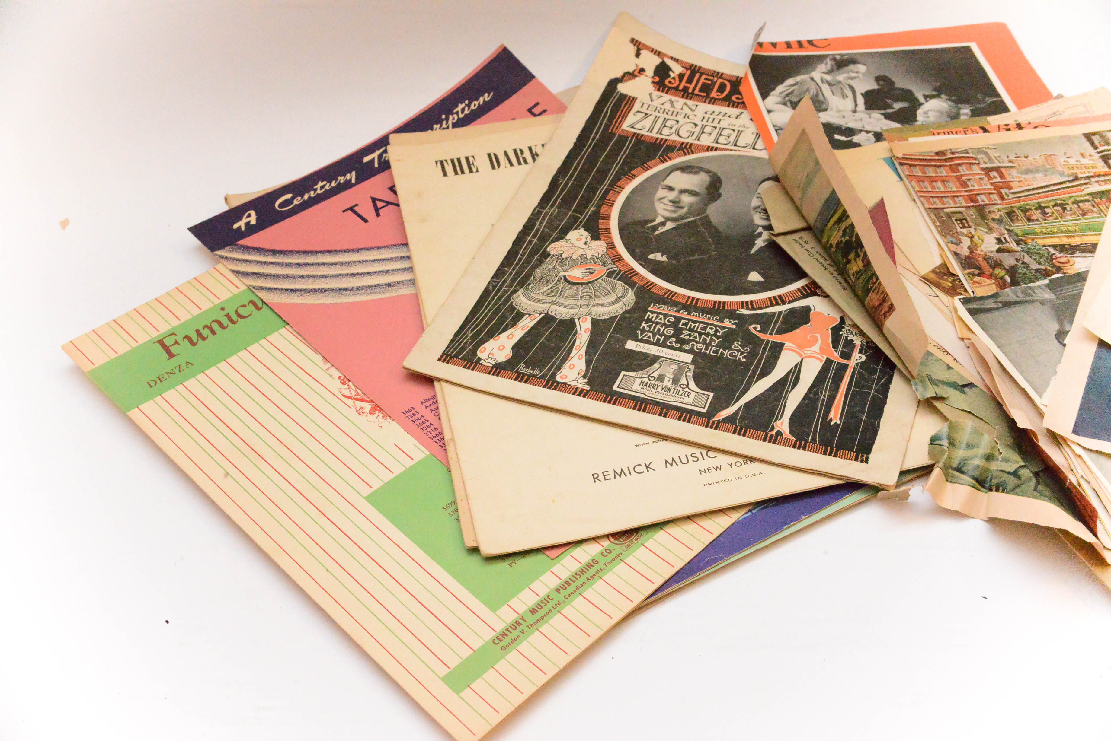 Collection of Vintage Magazine Clippings and Sheet Music