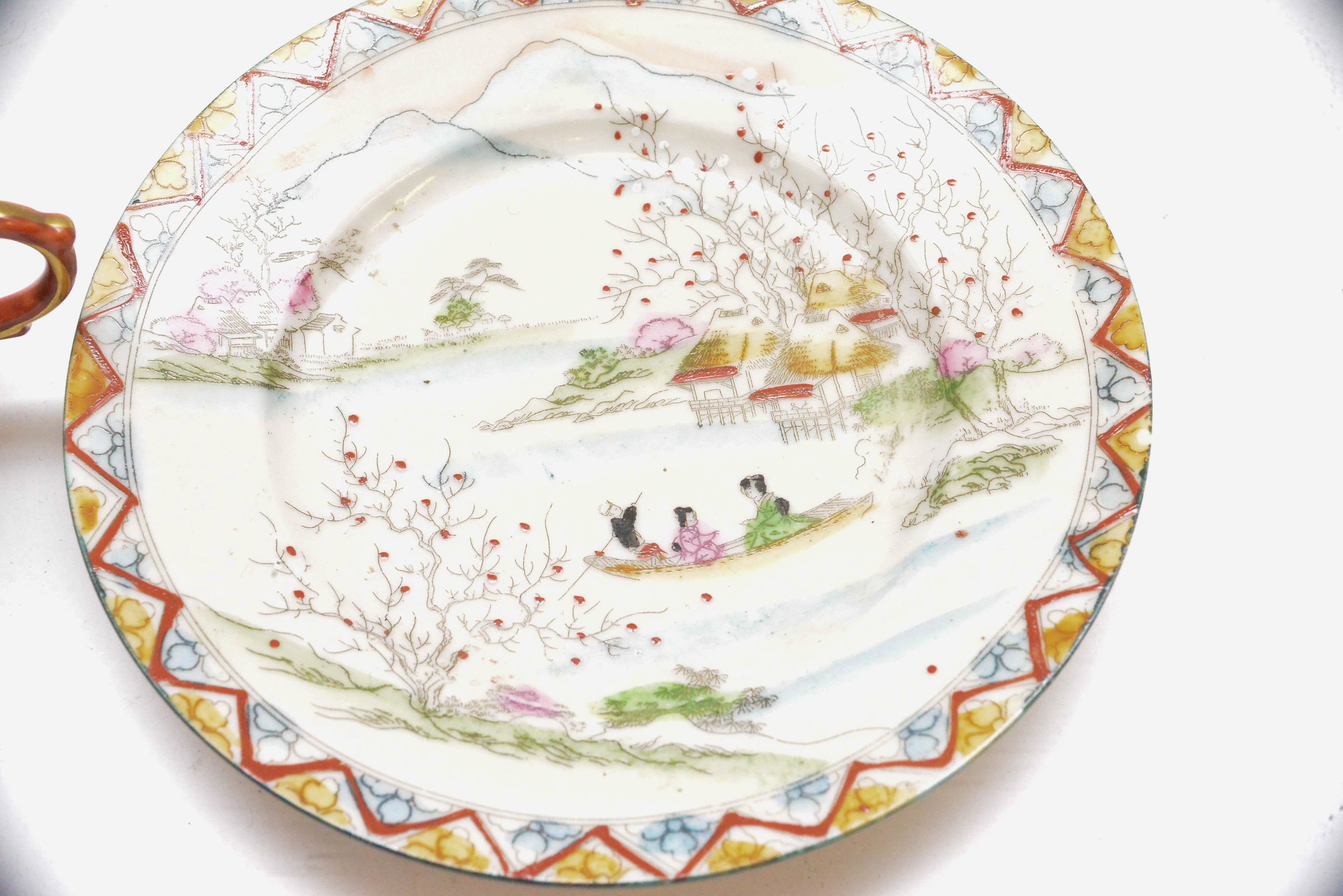 Pair of Japanese Porcelain Teacups and Saucers