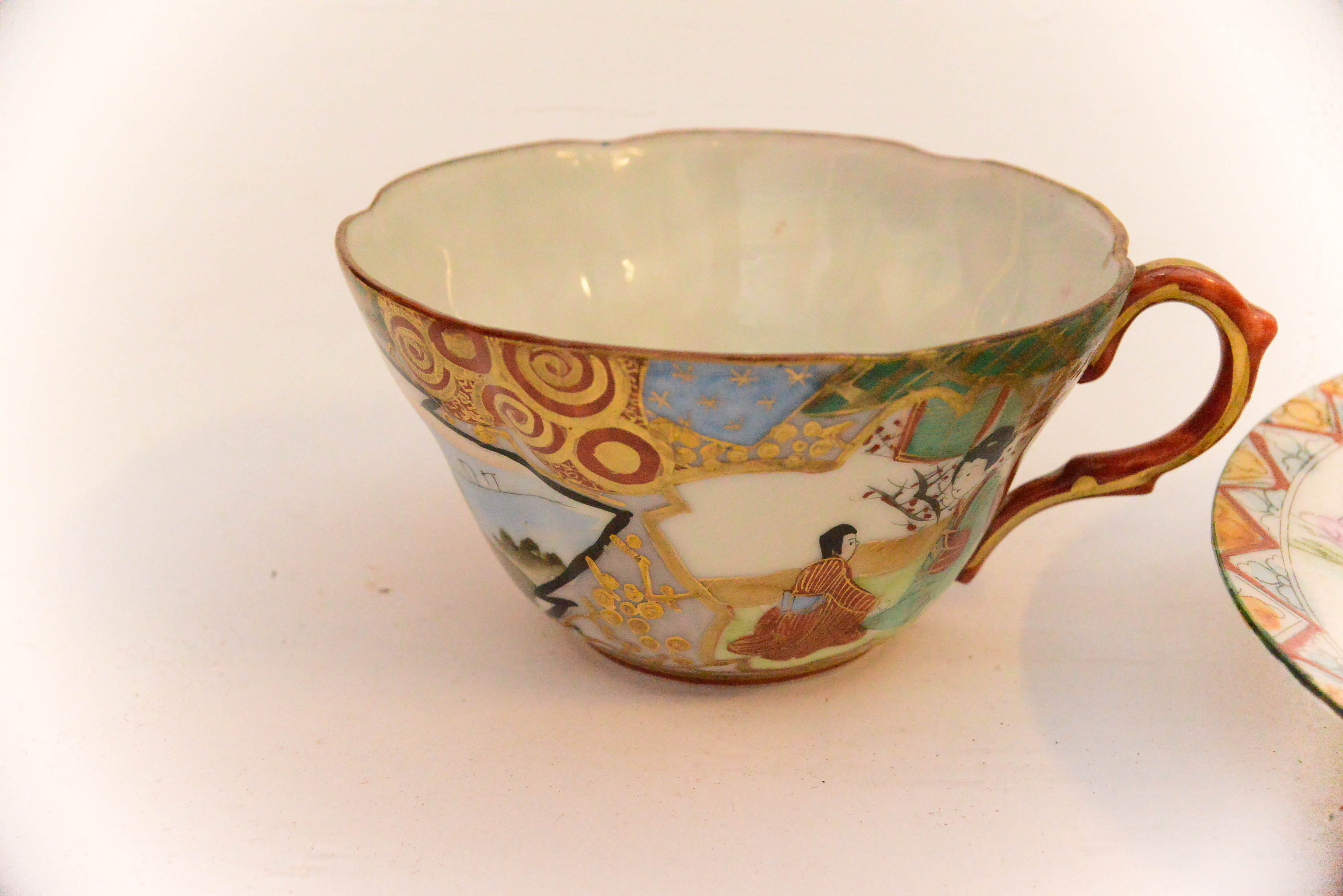 Pair of Japanese Porcelain Teacups and Saucers