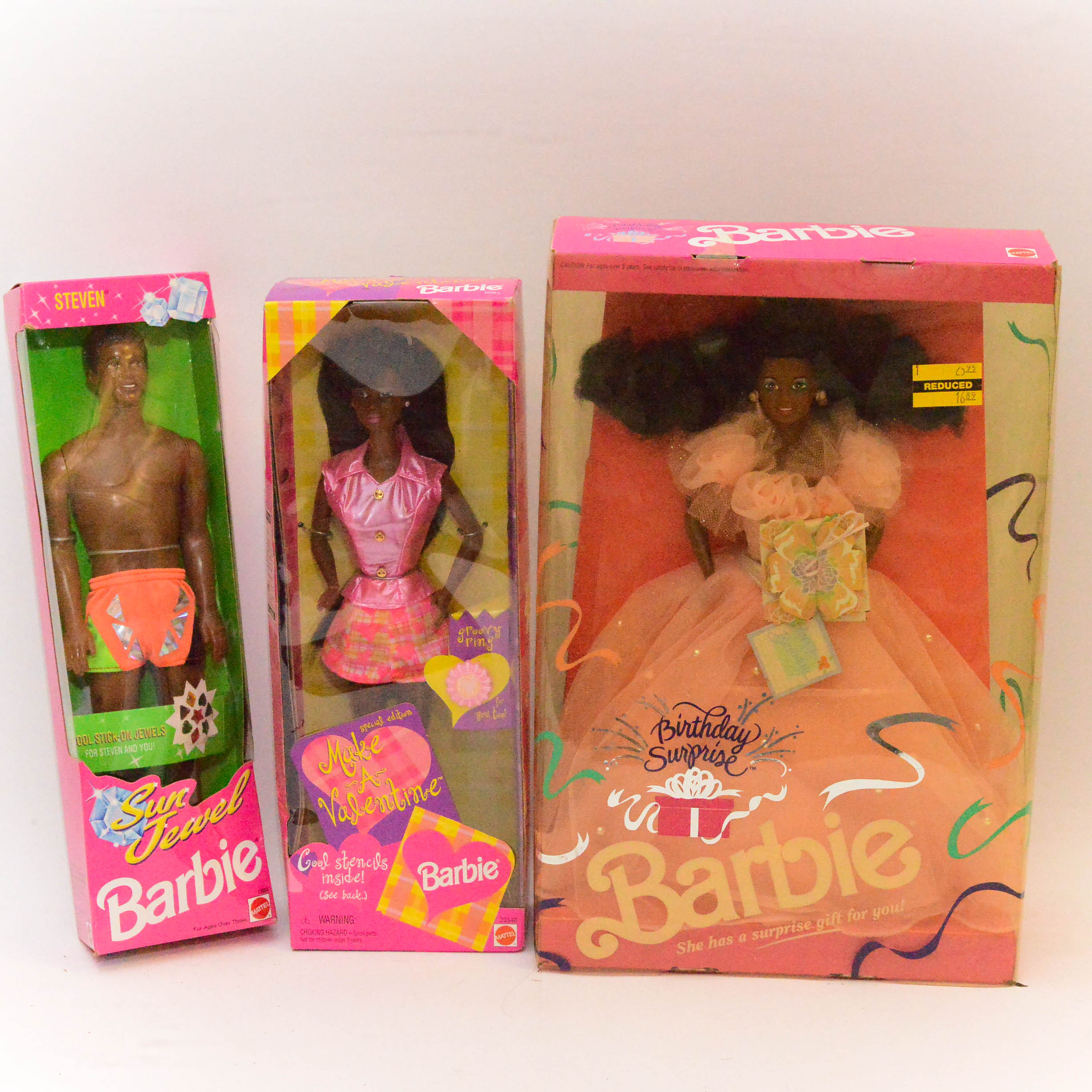Three 1990s African American Barbies