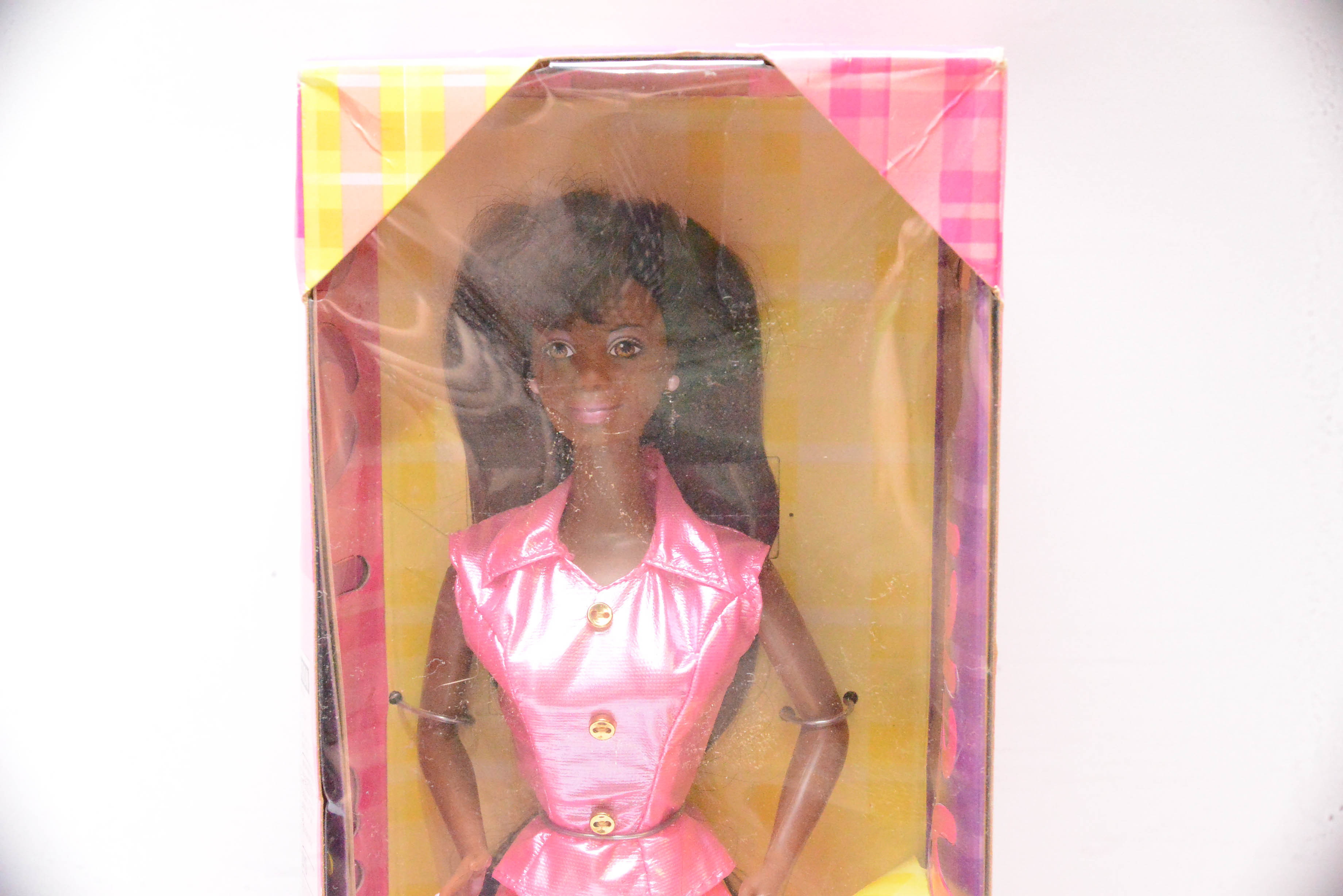 Three 1990s African American Barbies