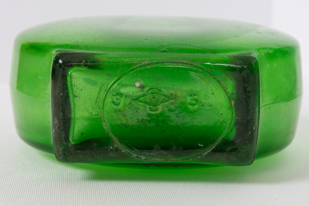 Assorted Green Glass Bottles