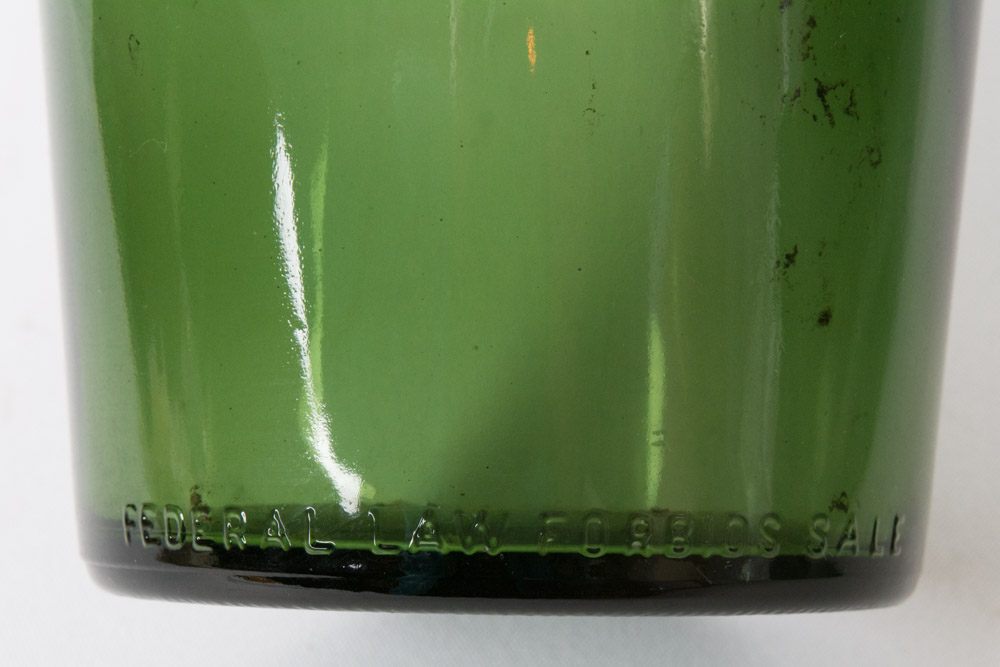 Assorted Green Glass Bottles