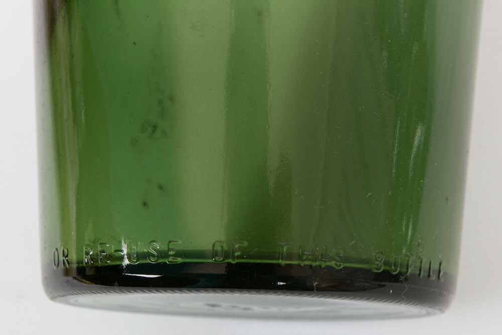 Assorted Green Glass Bottles