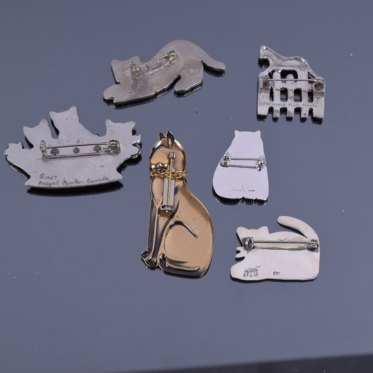 Collection of Pins With Cat Box