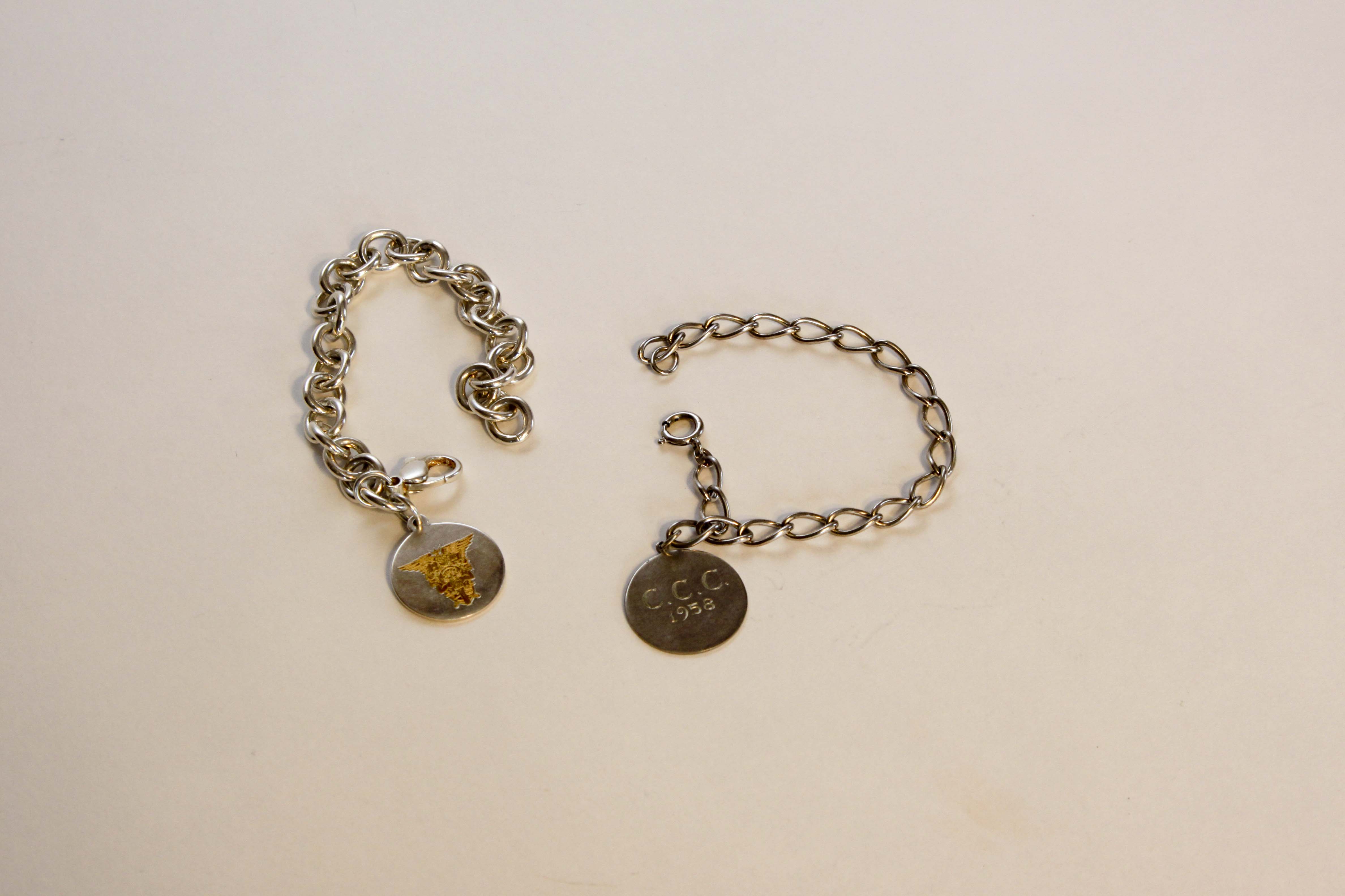 Two Sterling Charm Bracelets