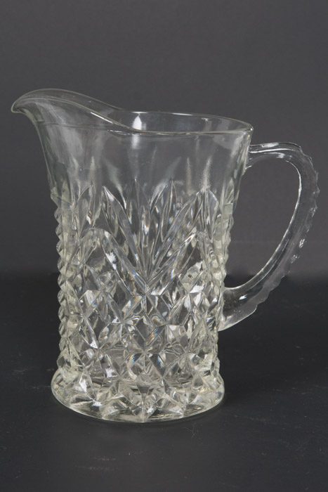 Selection of Cut Glass Pitchers and Candlesticks
