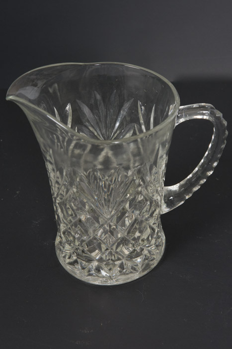 Selection of Cut Glass Pitchers and Candlesticks