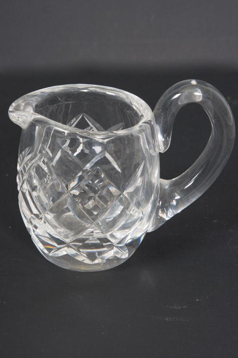 Selection of Cut Glass Pitchers and Candlesticks