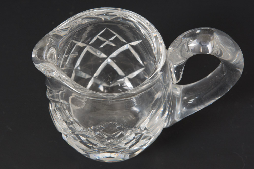 Selection of Cut Glass Pitchers and Candlesticks