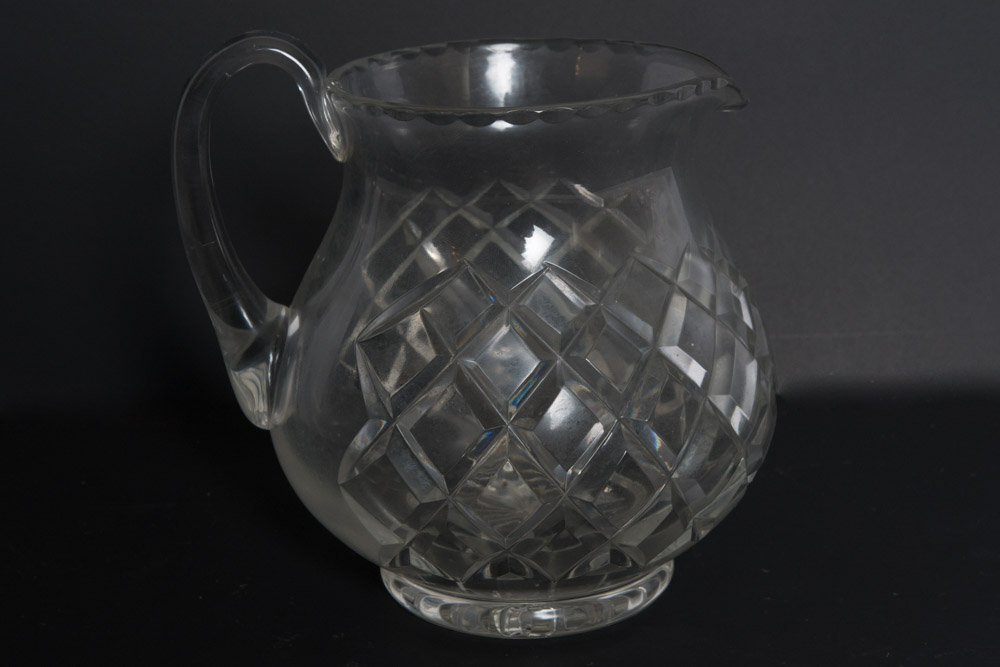 Selection of Cut Glass Pitchers and Candlesticks