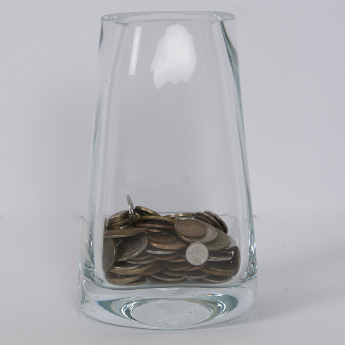 Collection of Mexican and Canadian Coins in a Glass Vase
