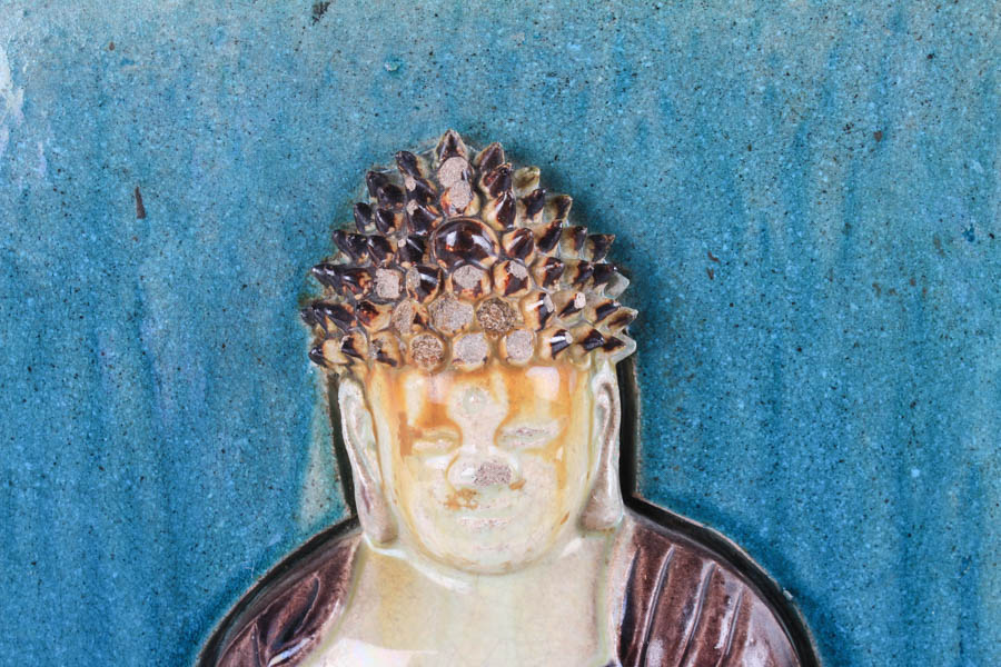 Pair of Glazed Stone Buddhist Plaques
