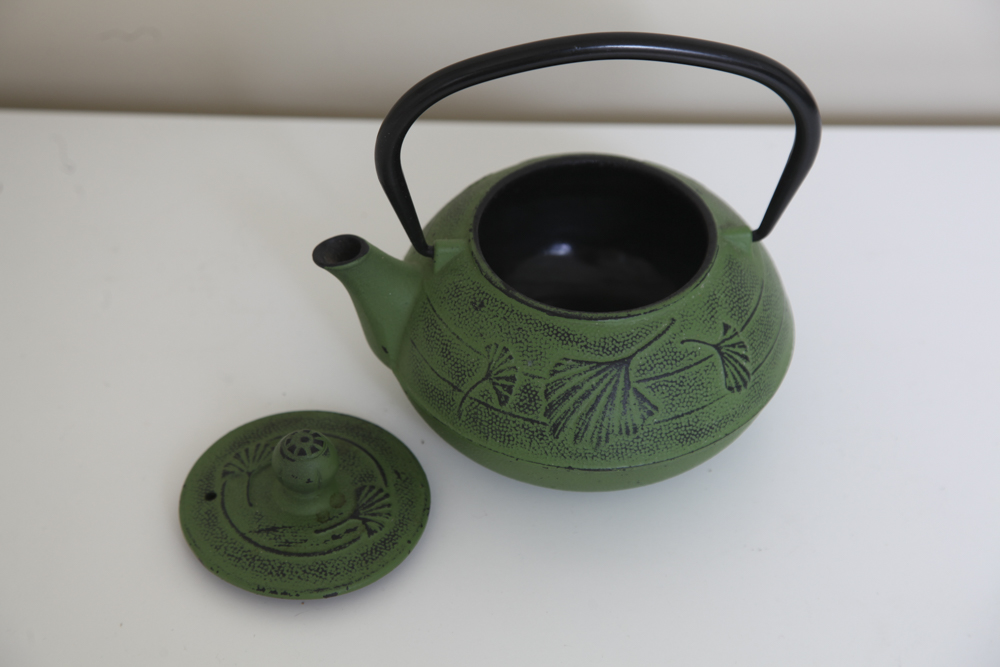 Cast Metal Teapot and Cup