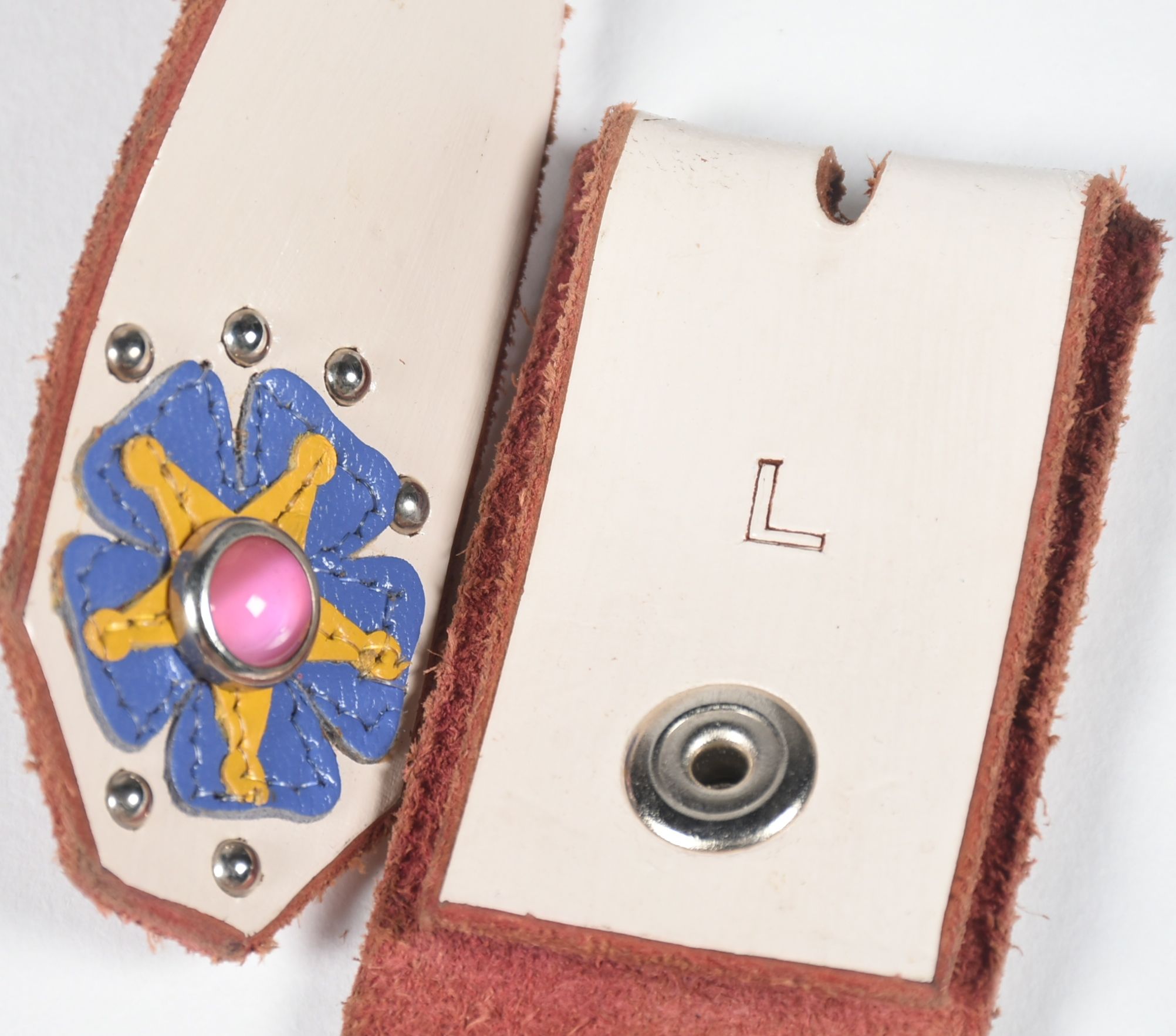 A Pair of Custom Jeri Hart Multi-Color Leather Belts in Off-White and Black with Rhinestones